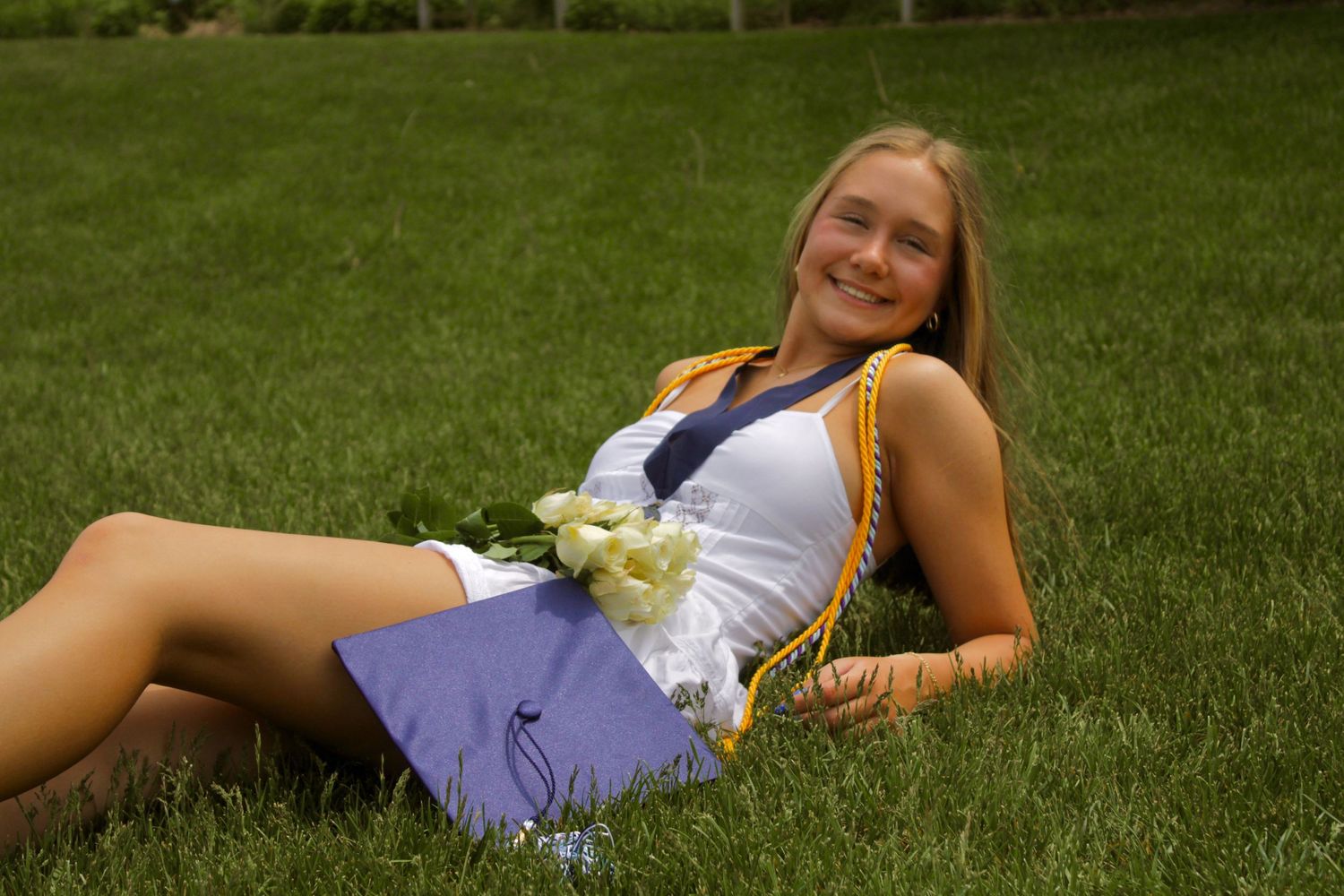 Graduation & cap-and-gown portraits in Green Bay. Briana Rose Photography creates professional, personalized, and memorable senior photos