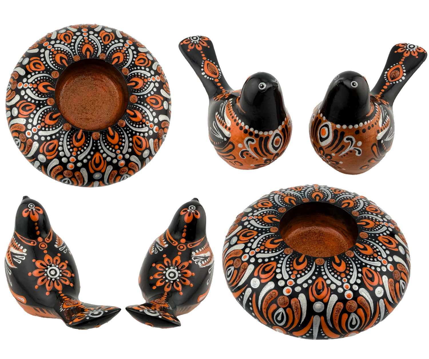 Hand-painted terracotta bowl and bird figurines featuring intricate orange, black, and white mandala folk art patterns.