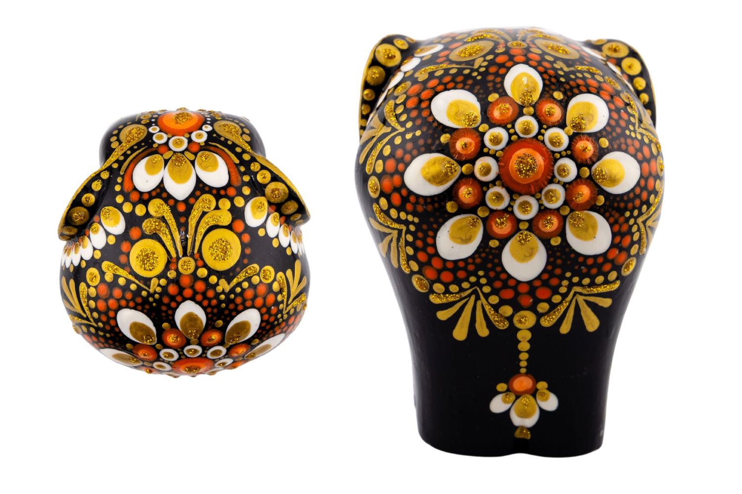 Black decorative owl and ball figurines with vibrant gold, orange, and white dot art floral patterns, shown as a set.