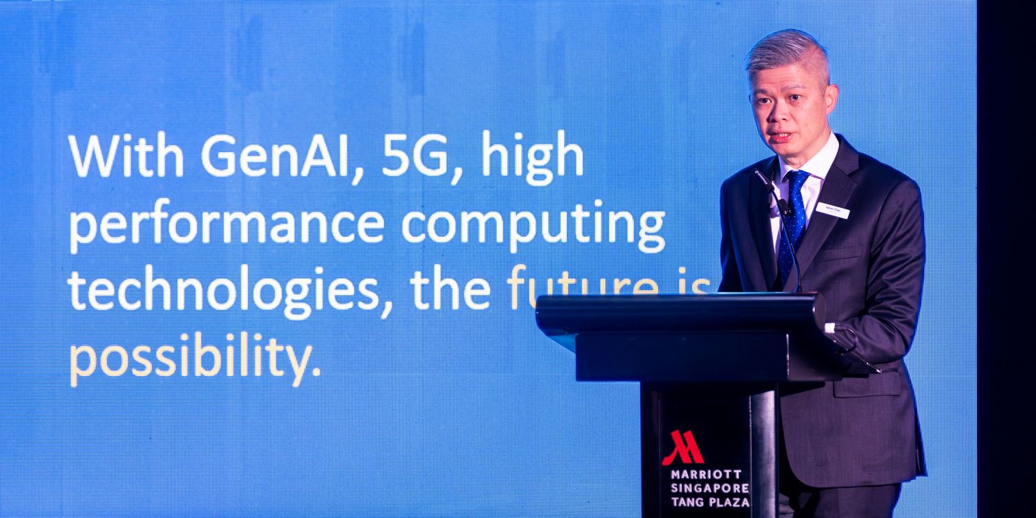 Business speaker presents at Marriott Singapore Tang Plaza discussing GenAI, 5G, and high performance computing.