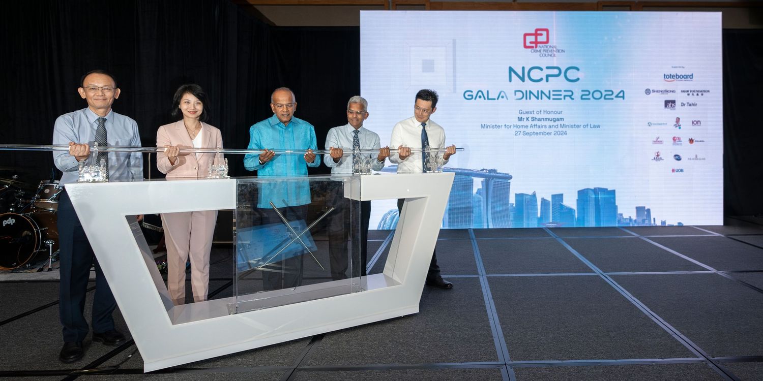 Speakers on stage at NCPC Gala Dinner 2024 corporate event in Singapore.