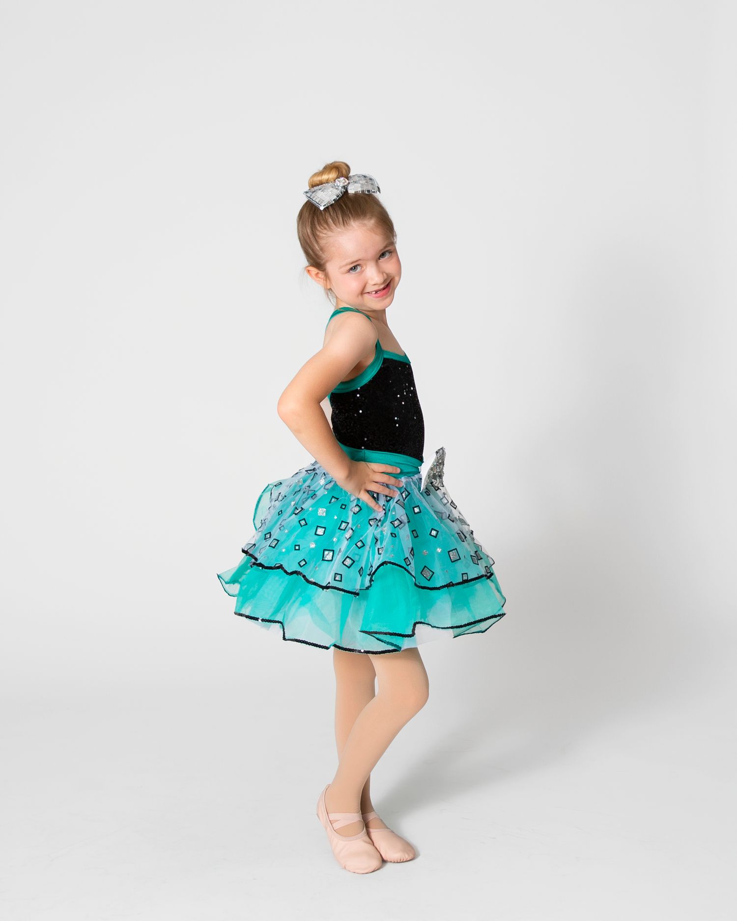 Dancer in teal sequined tutu dress shows dynamic dance poses against white background.