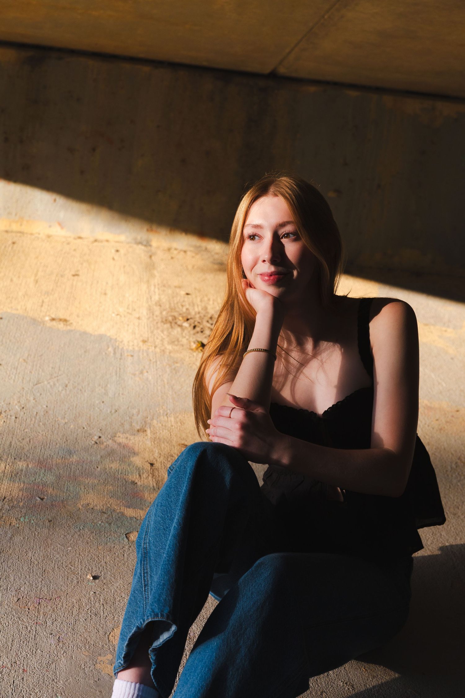 High school senior portrait session in Pflugerville, TX. Artistic portrait series with dramatic shadows and lighting.