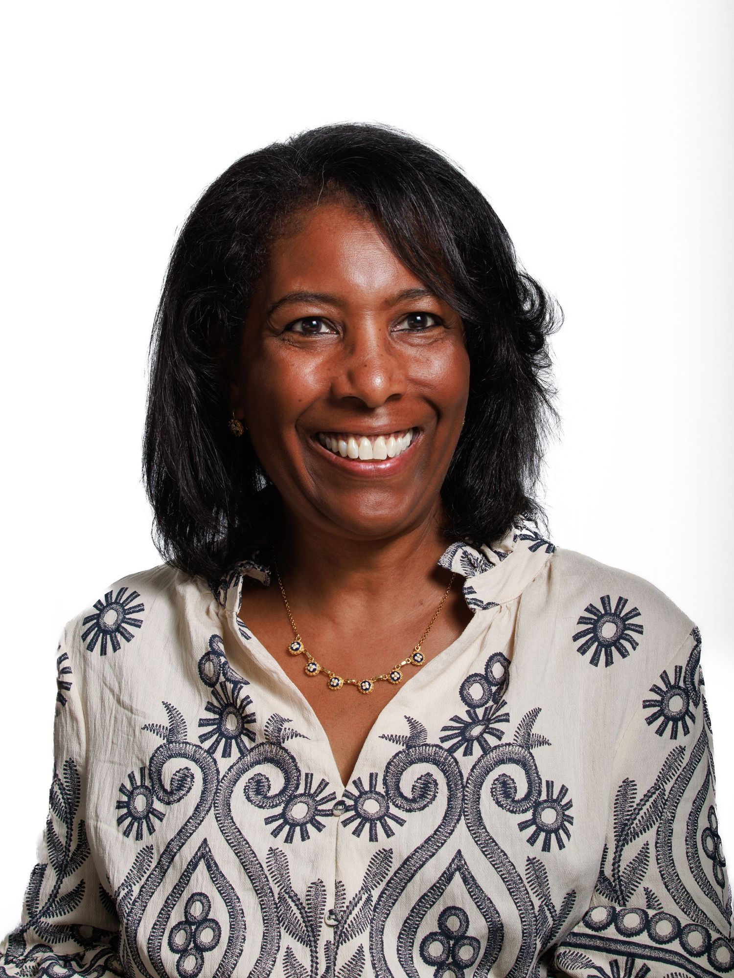 portrait corporate hea shot woman smiling blouse, straight hair