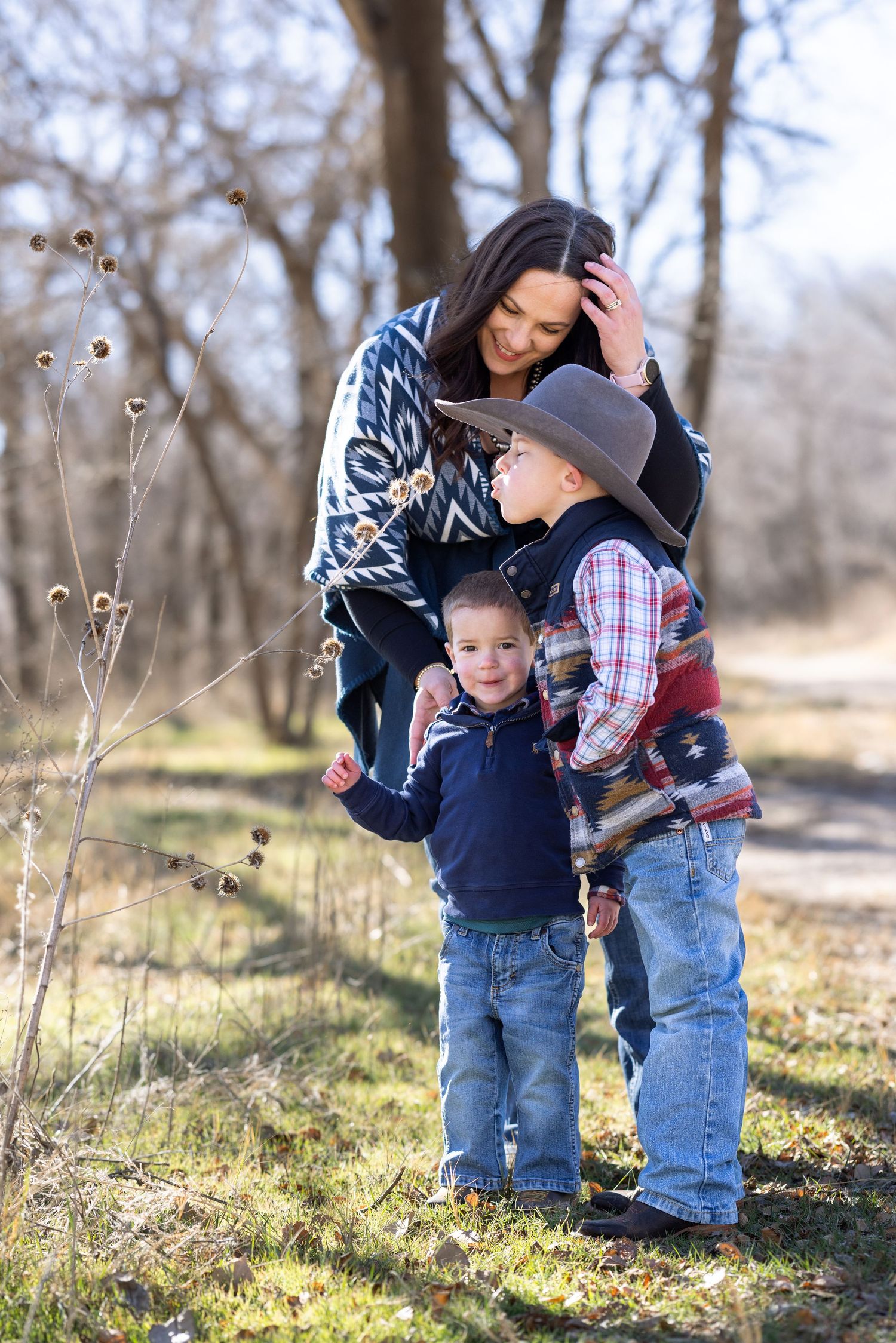 Candid outdoor family moments captured in a series of playful interactions on a sunny autumn day.