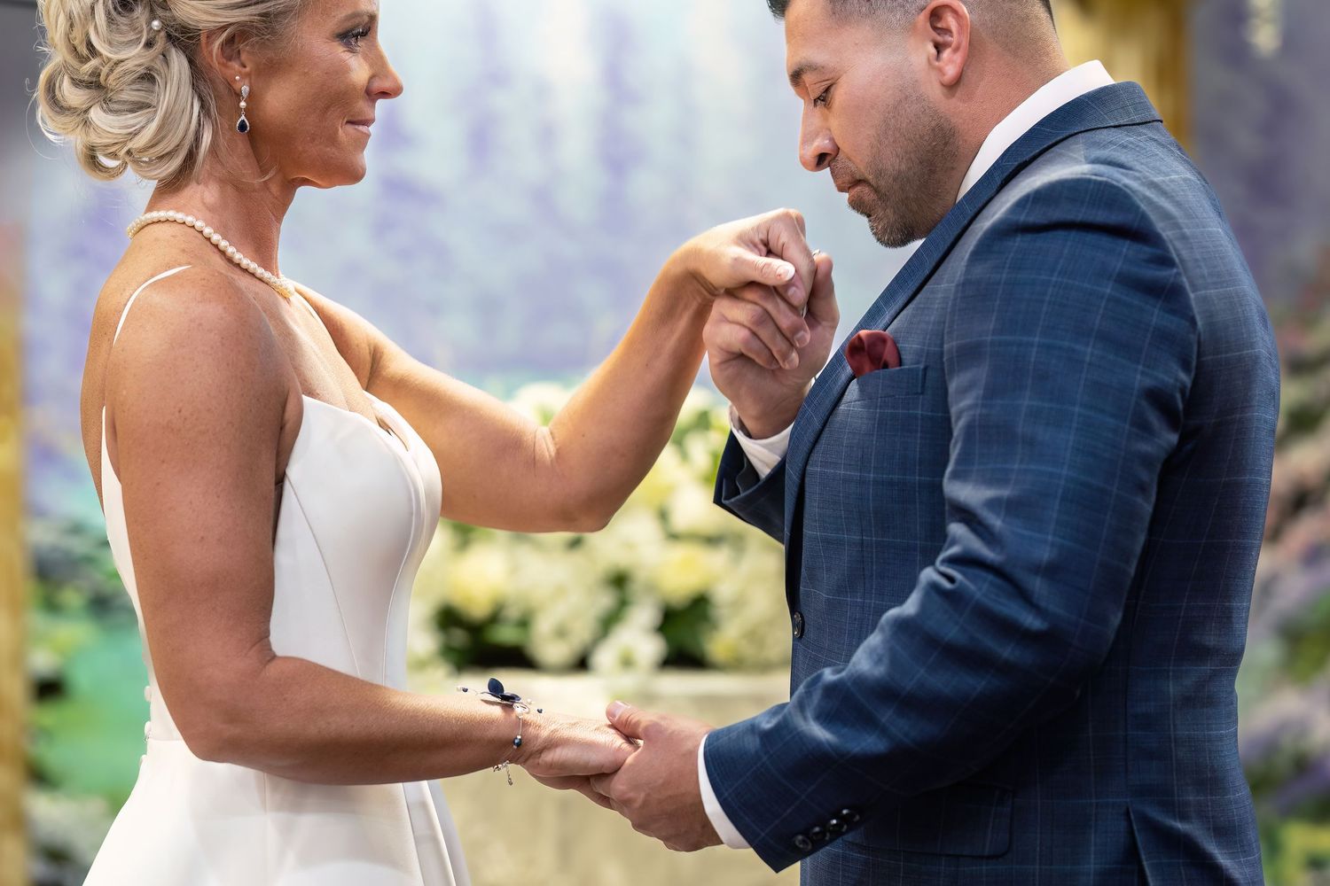Intimate wedding ceremony moment captured outdoors.