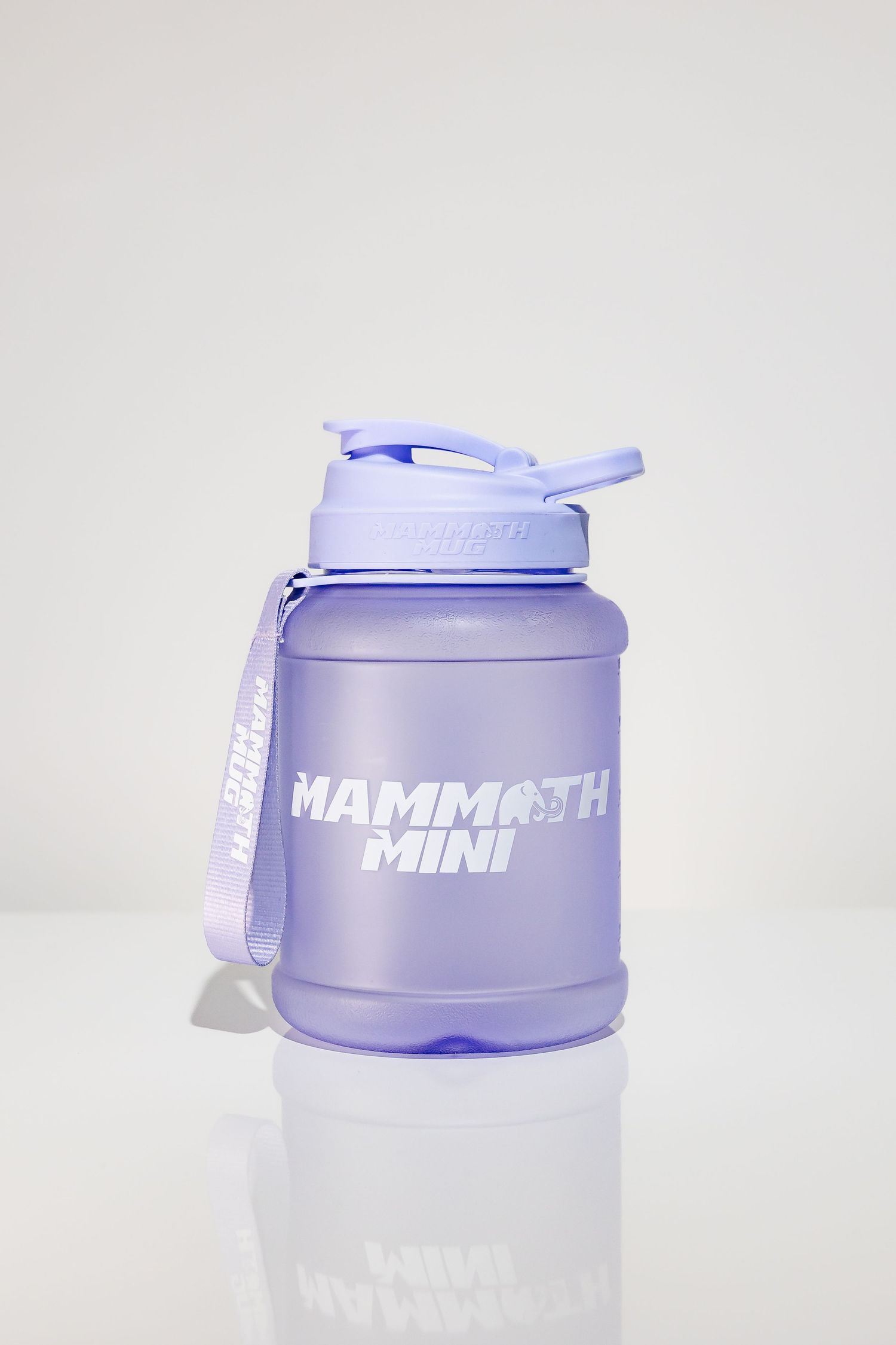 Lavender colored Mammoth Mini protein shaker bottle shown from multiple angles.