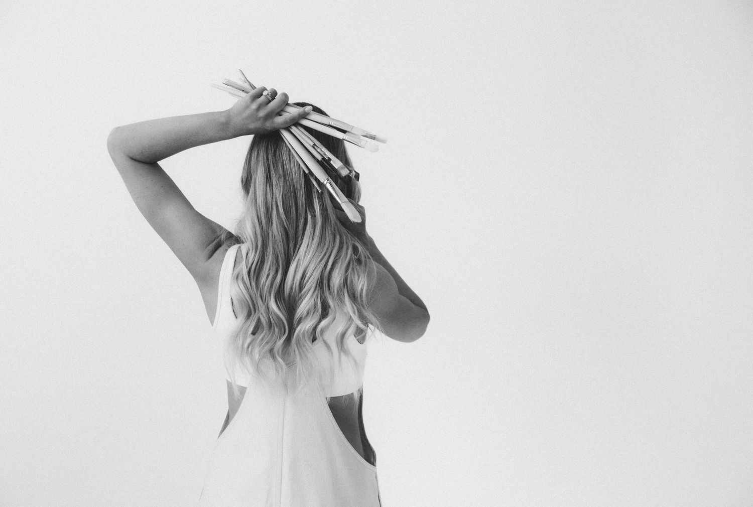 Black and white artistic portrait series showing minimal gestures and movement.