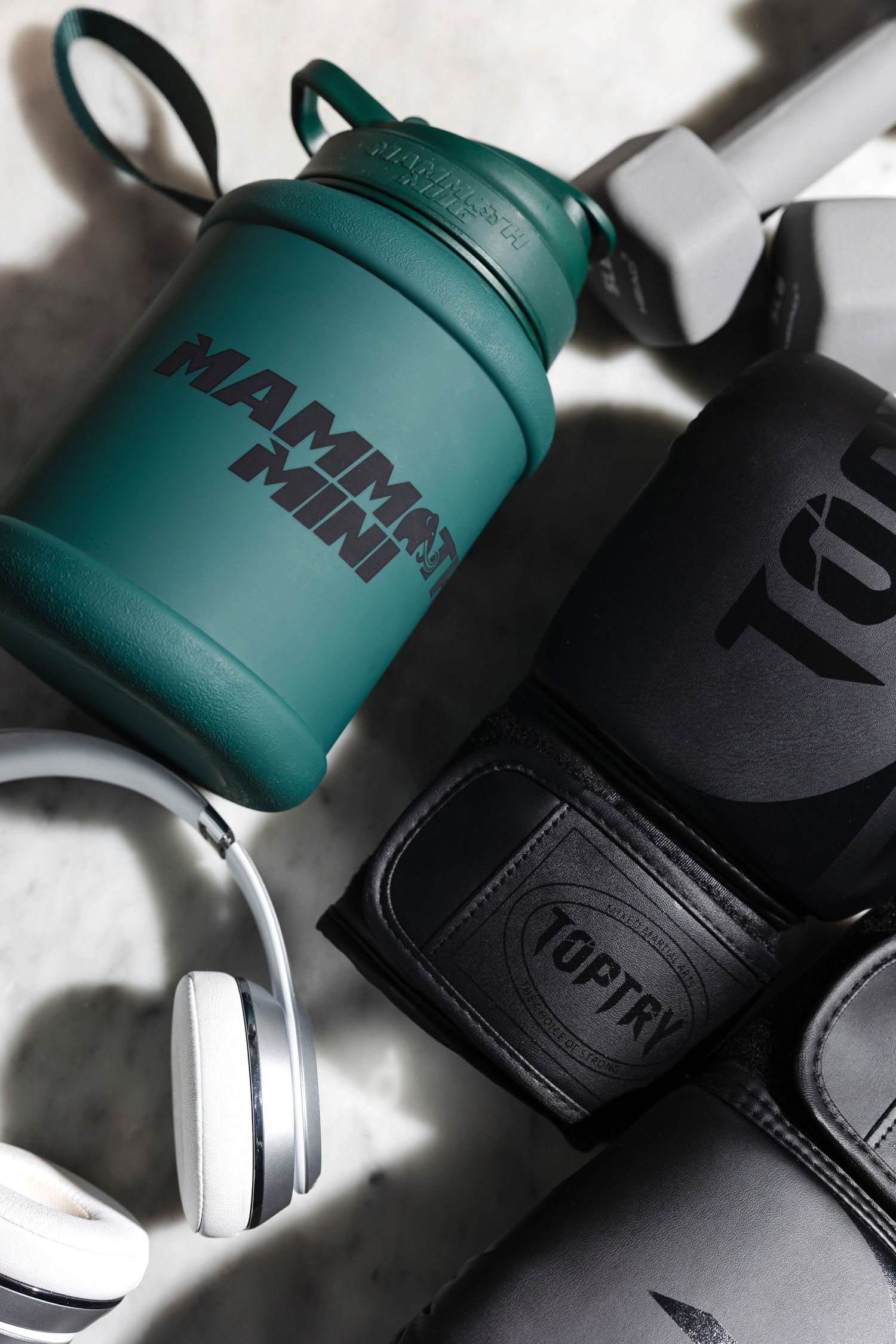 Close-up of green and black sports water bottles with modern design.