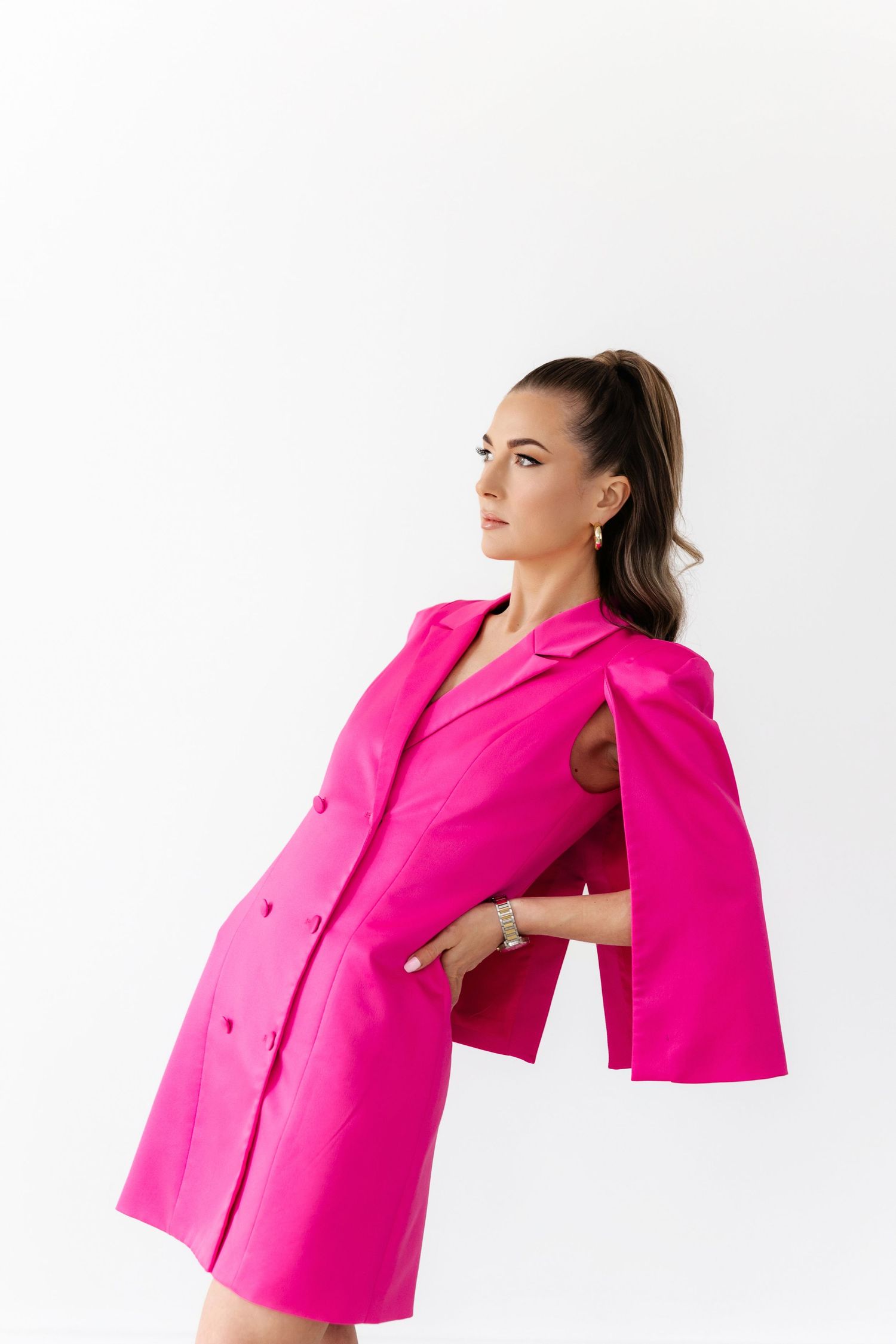 Hot pink oversized blazer shown in multiple angles against white background during fashion photoshoot.