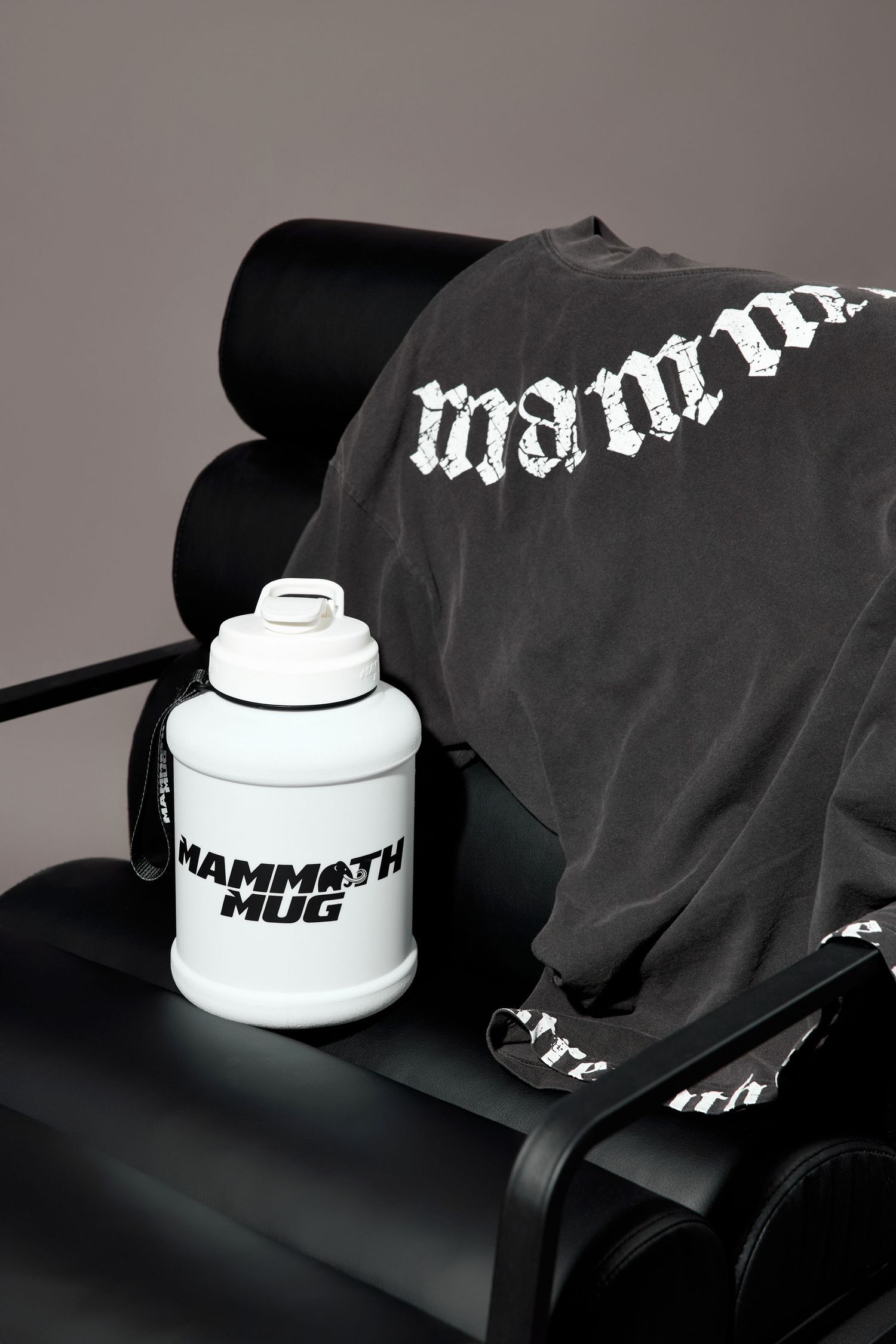 Black and white product shots of Mammoth branded merchandise with white container.
