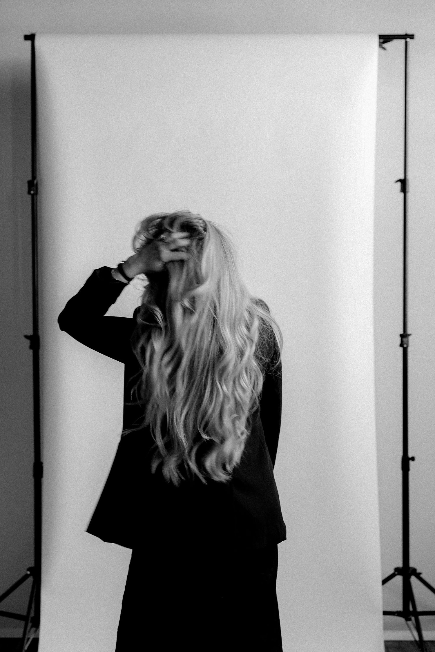Artistic black and white silhouette shots showing dynamic movement and poses.