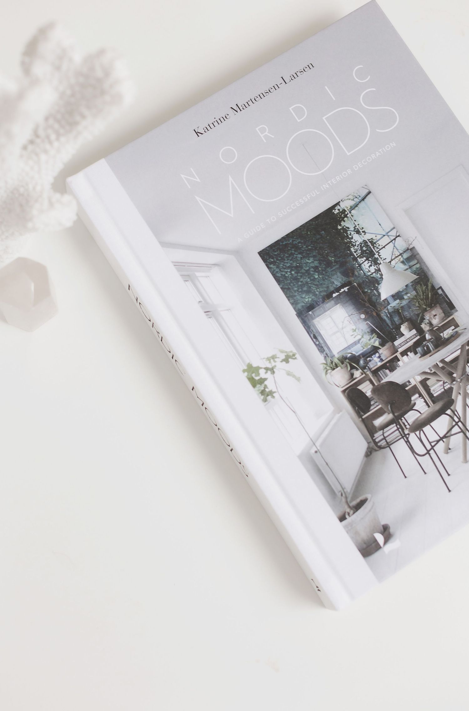 Multiple angles of Nordic Moods book cover showing minimalist design.