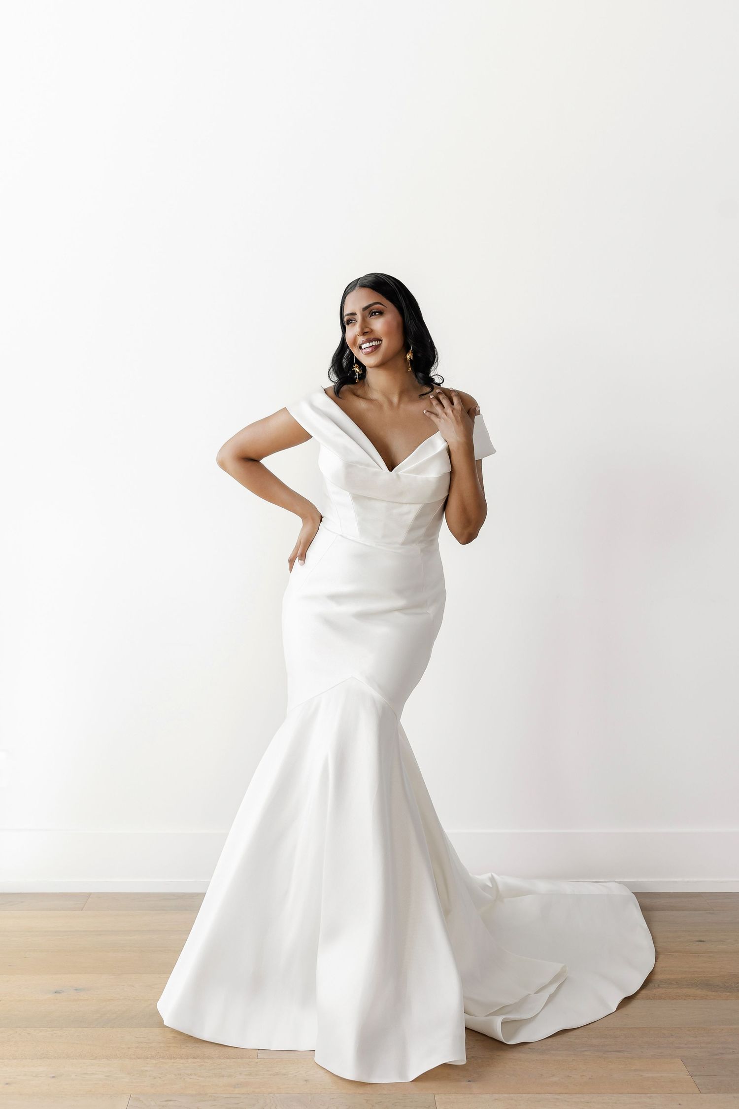 Elegant white wedding dress with sweetheart neckline and full skirt shown in multiple angles against white background.