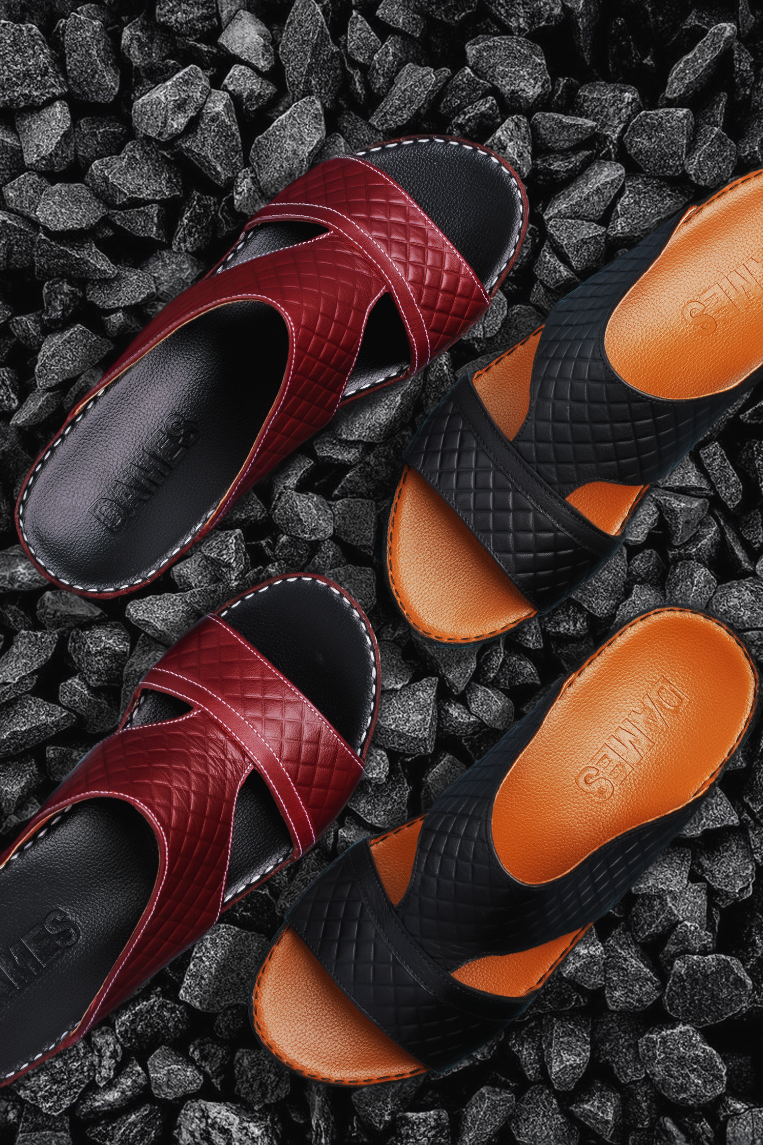Commercial product photography of premium leather shoes styled on a textured black background for advertising and e-commerce.