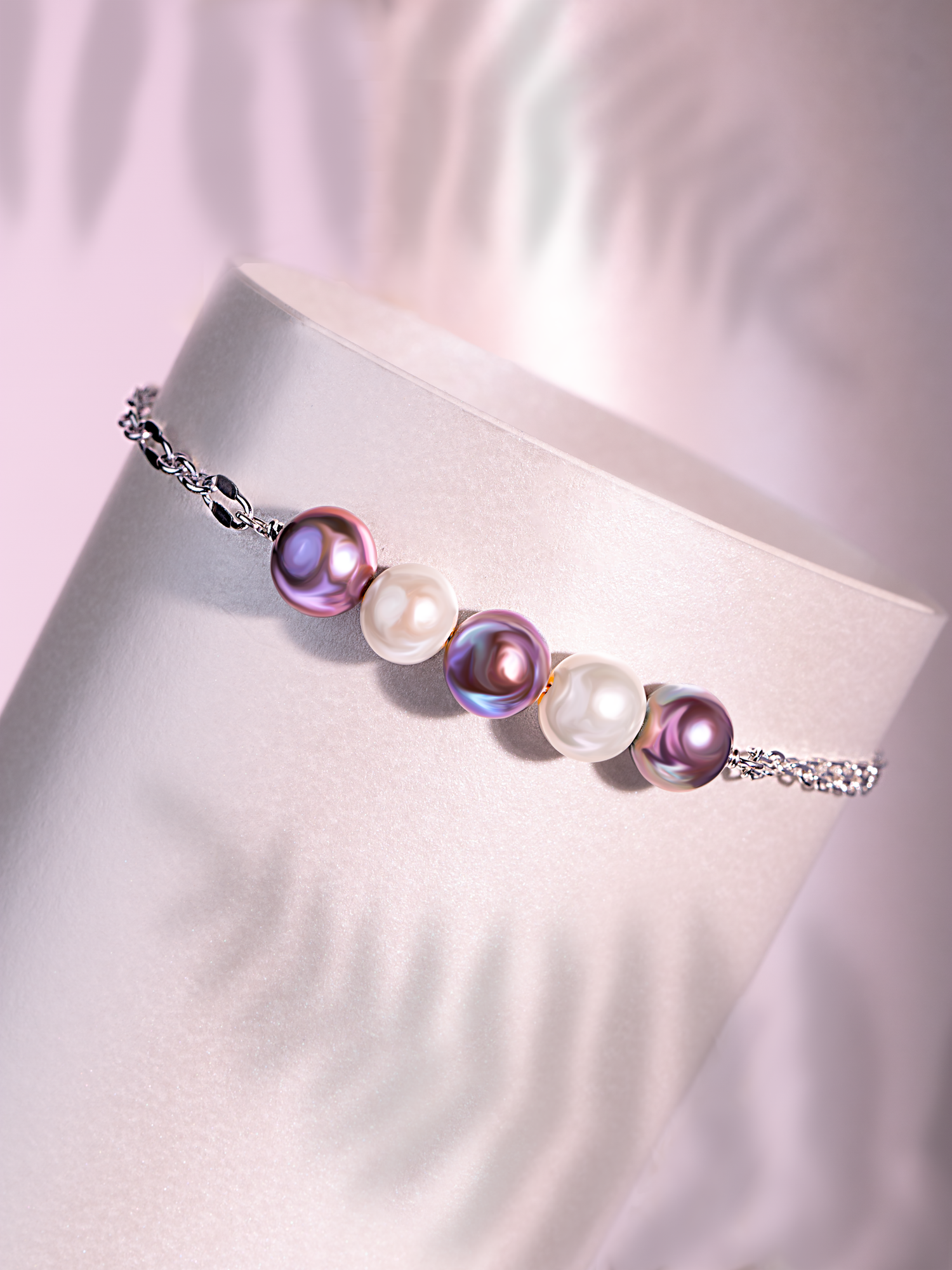 Luxury jewelry photography featuring a delicate gemstone bracelet captured with soft shadows and elegant commercial styling.