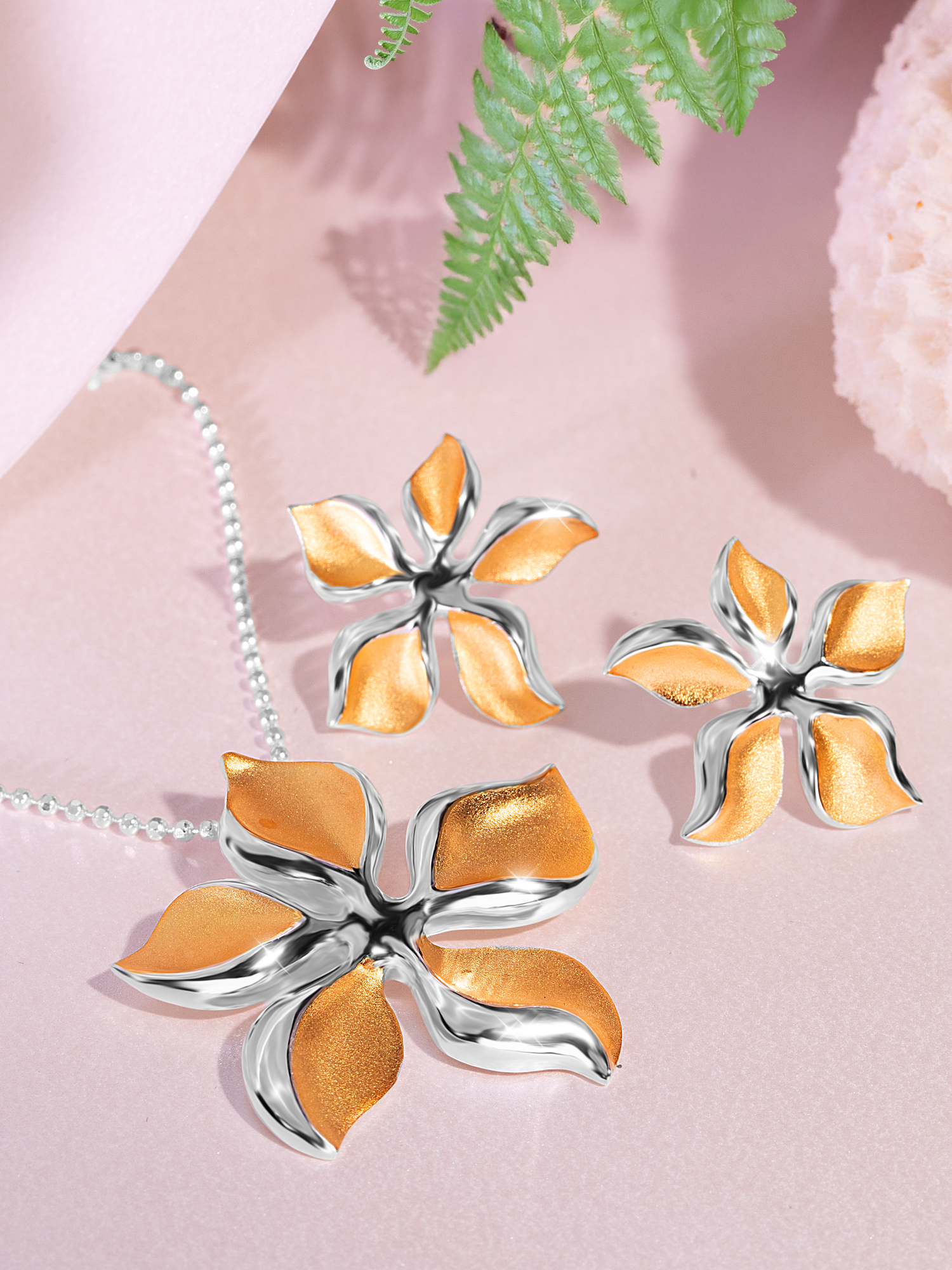 High-end jewelry photography featuring a yellow gemstone necklace styled with soft light and elegant commercial composition.