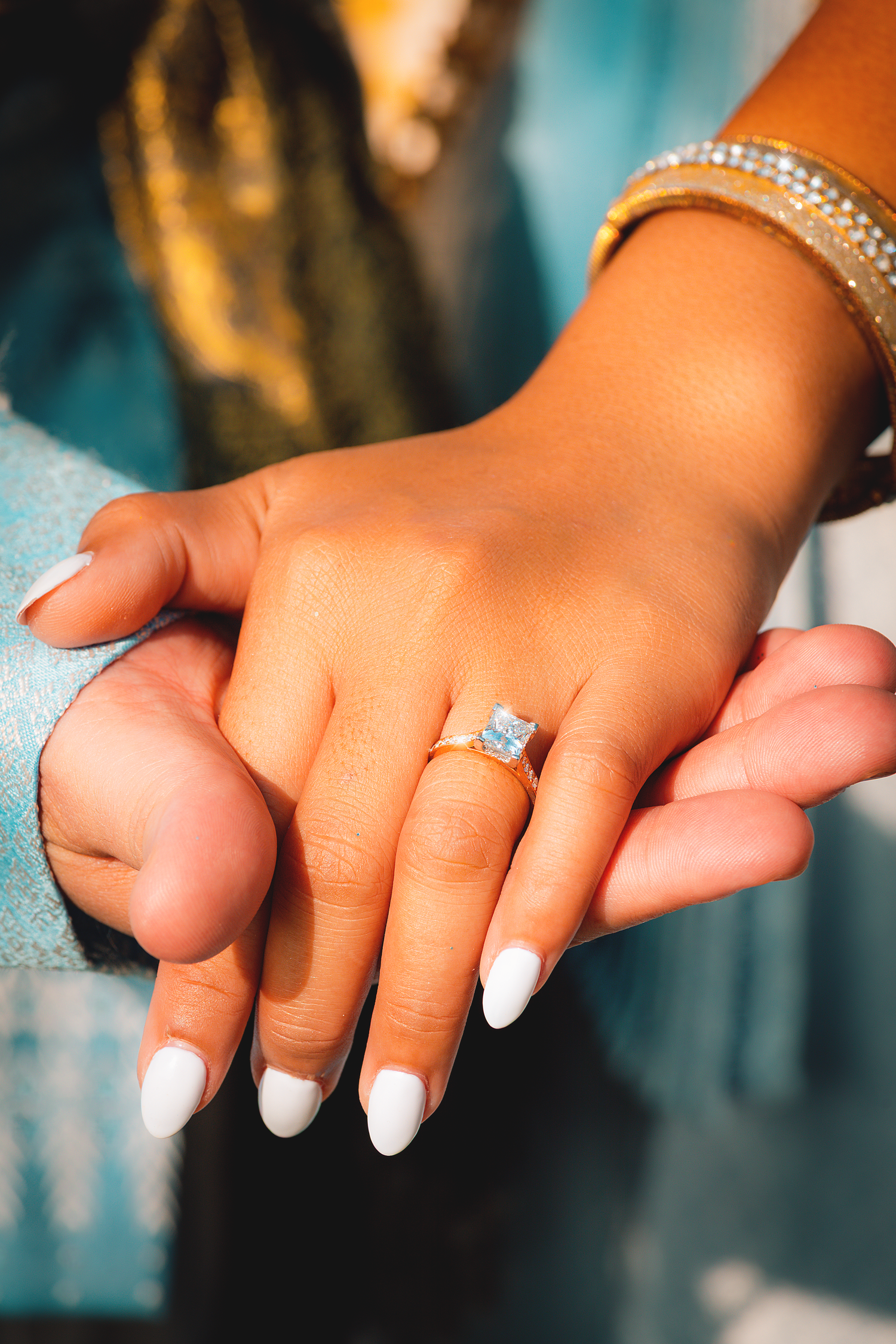 Close-up engagement photography featuring a diamond ring during a proposal session in Bangkok.
