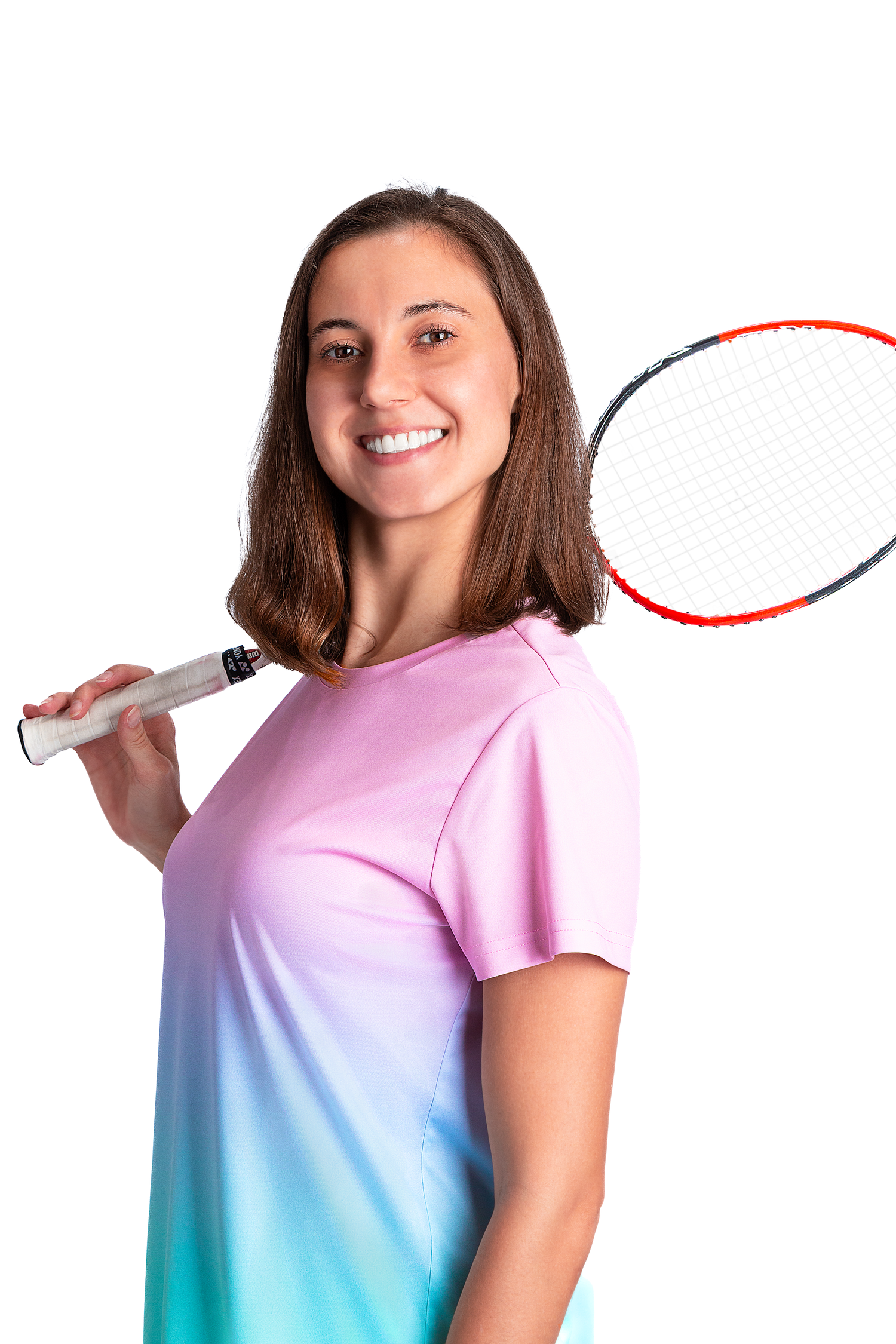 Sports portrait photography featuring a female tennis player holding a racket in a clean studio setup.