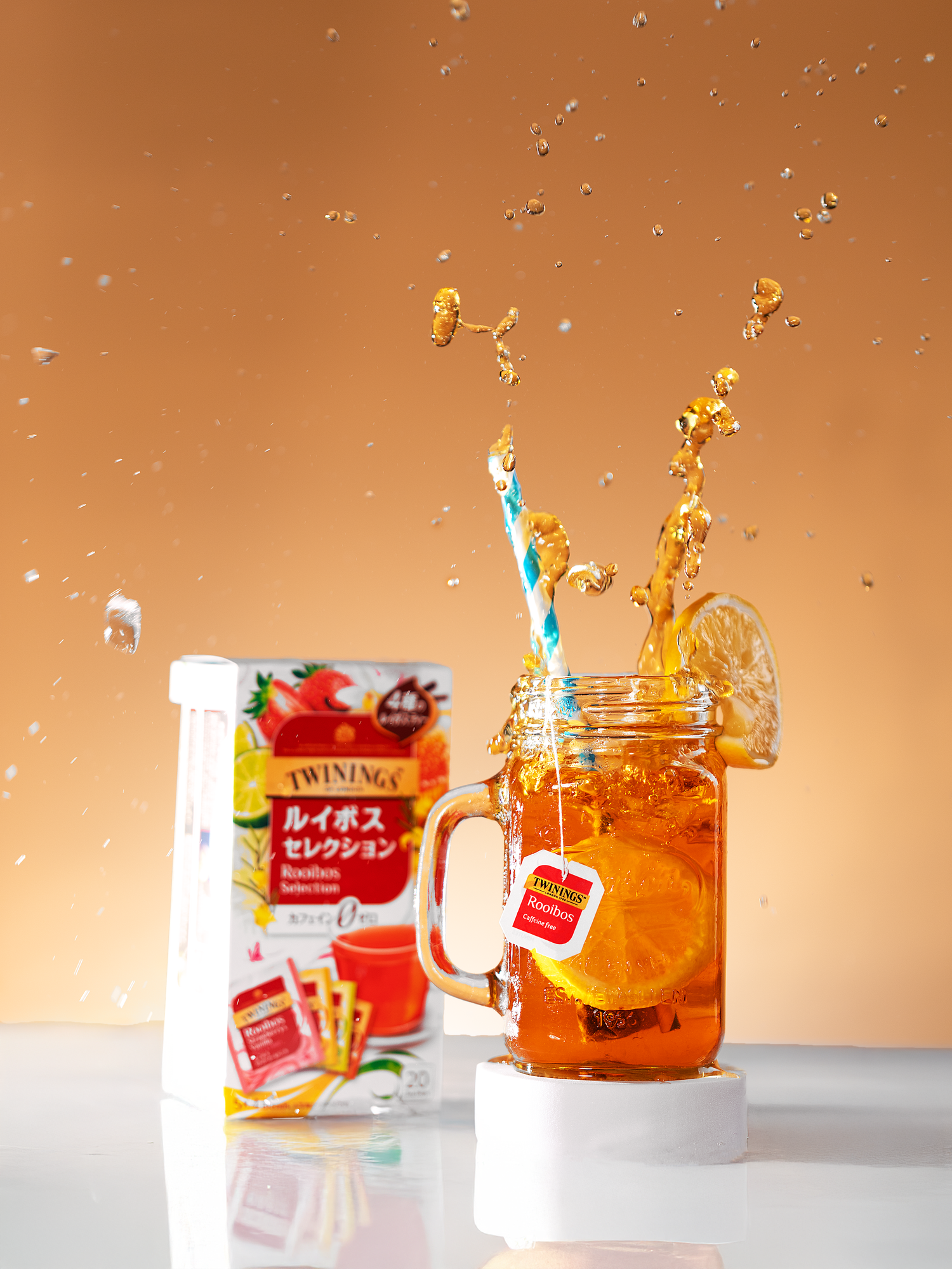 Creative drink photography featuring a refreshing beverage with splash action for commercial advertising and social media.