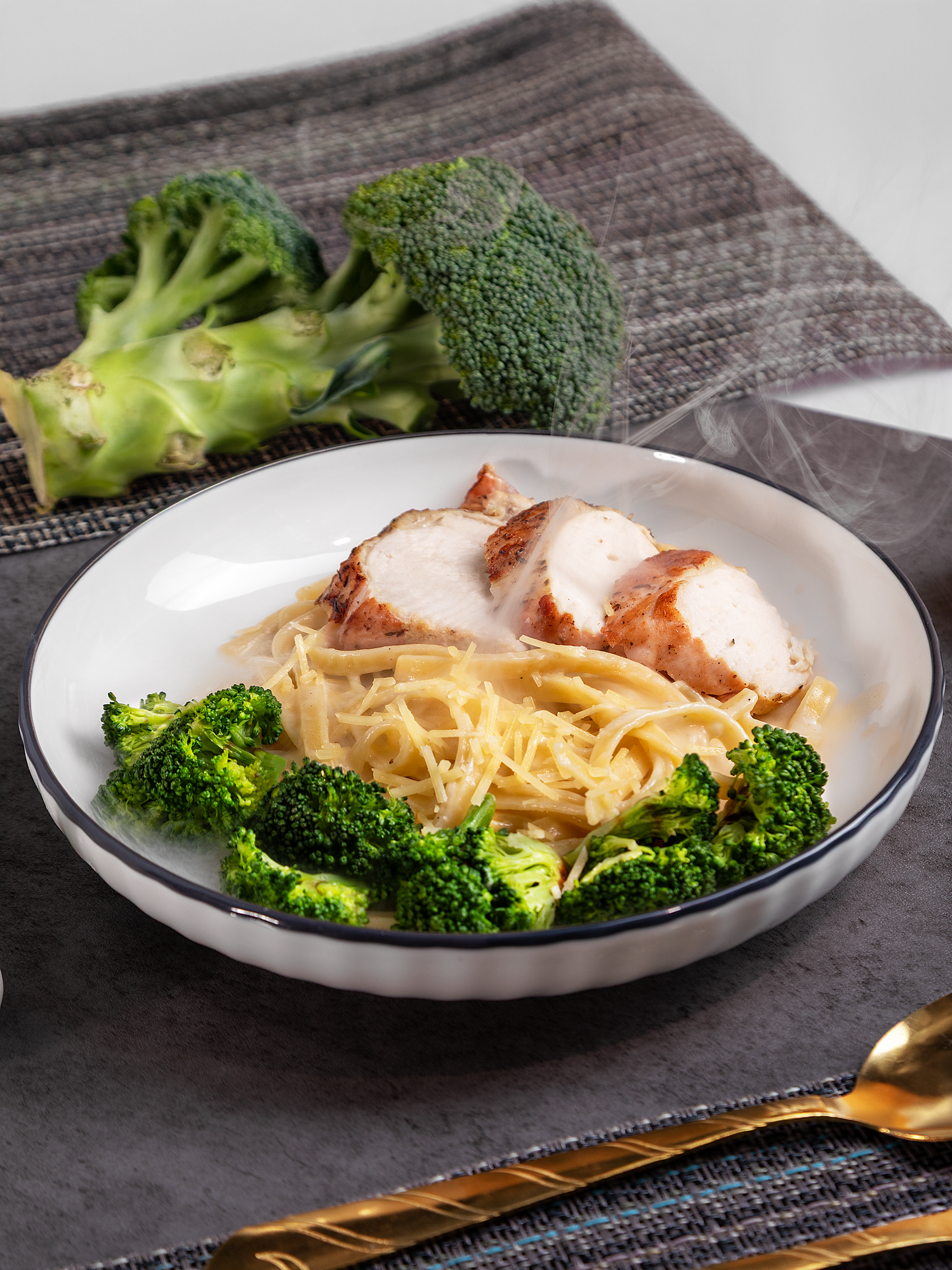 Professional food photography featuring a plated chicken and vegetable dish styled for restaurant menu and marketing content.