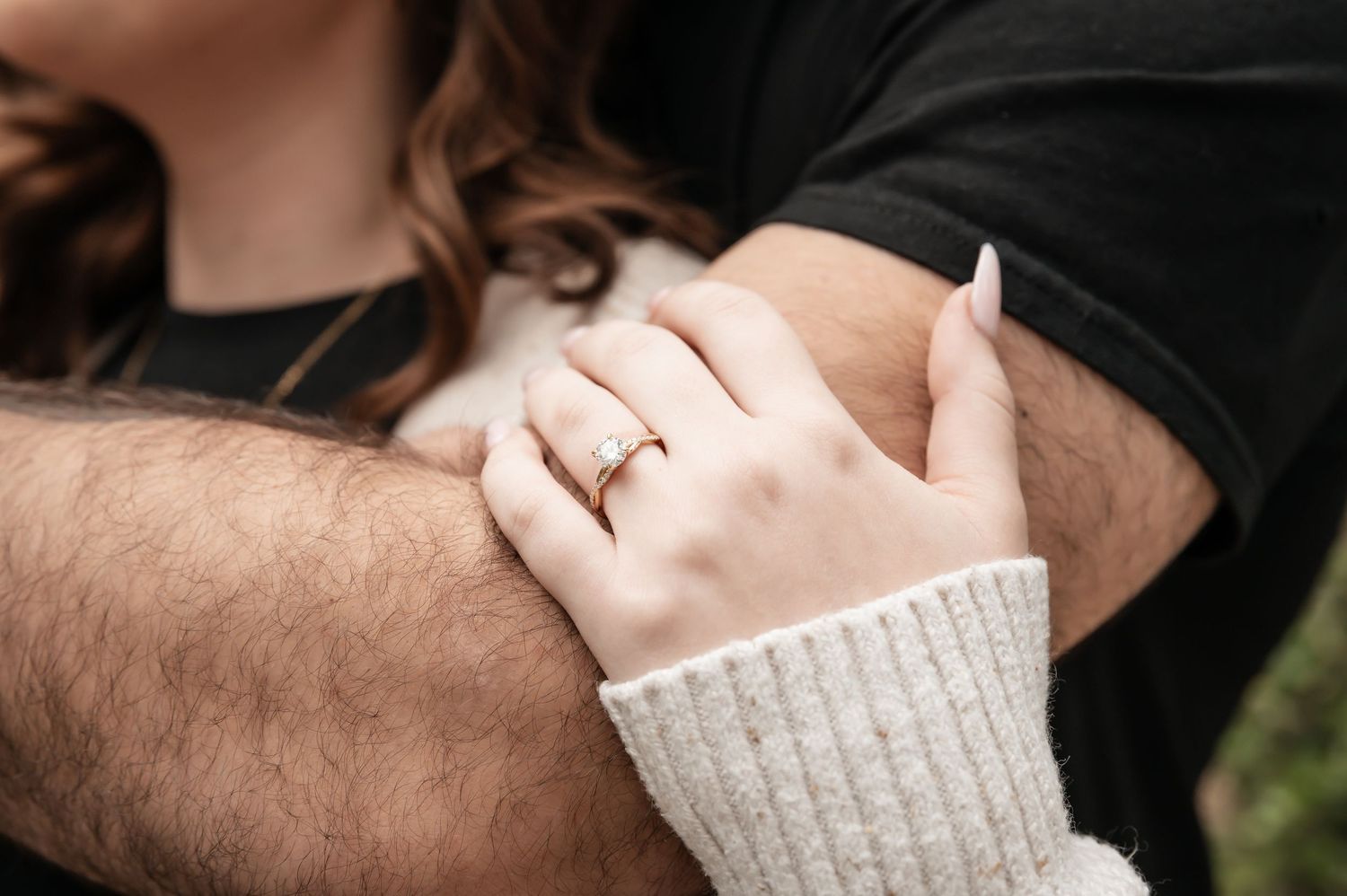 Intimate couple photography showing close-up details of hands and embraces.
