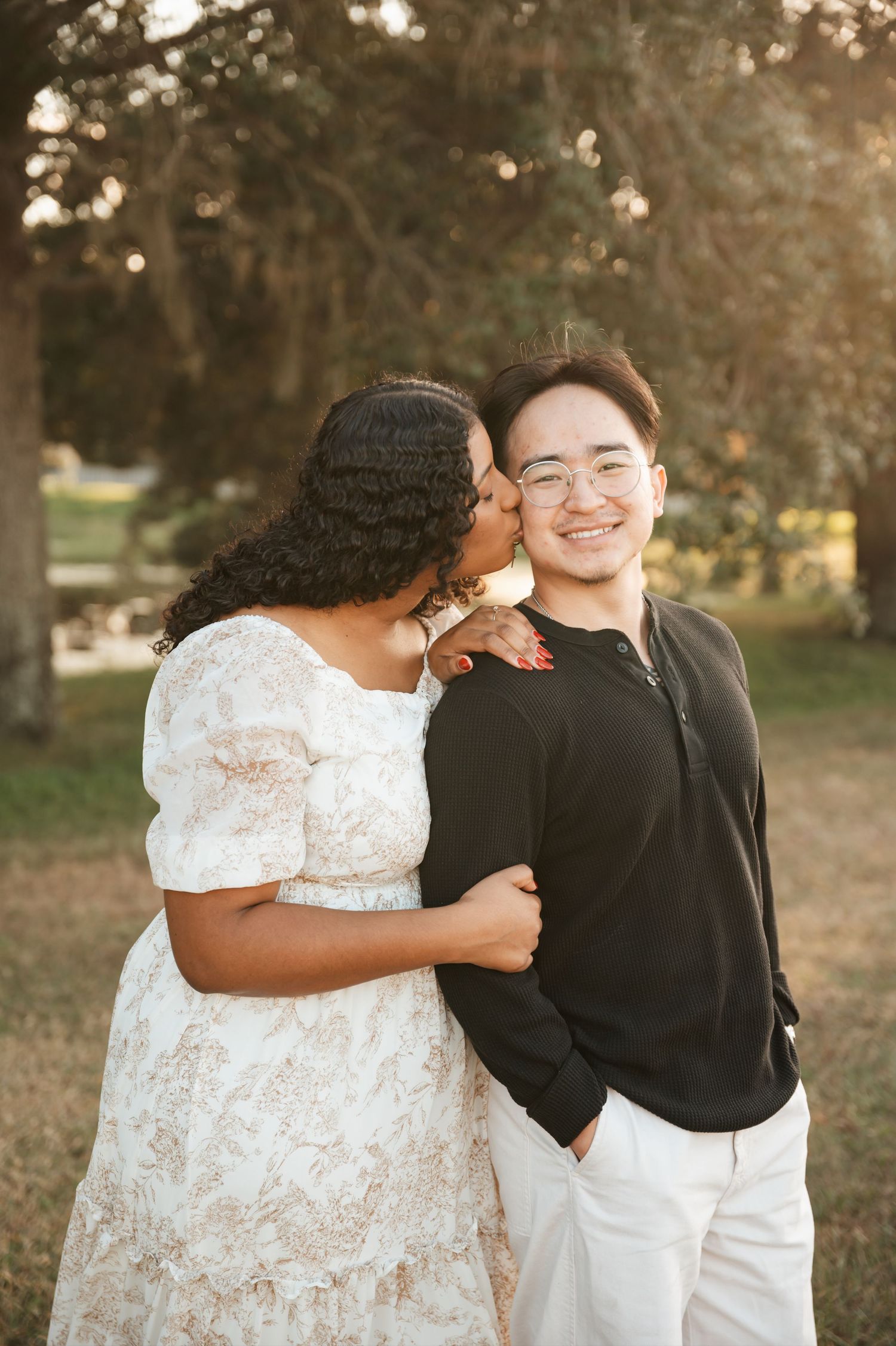 A couple shares tender moments in a series of romantic outdoor photos at sunset with warm golden lighting.