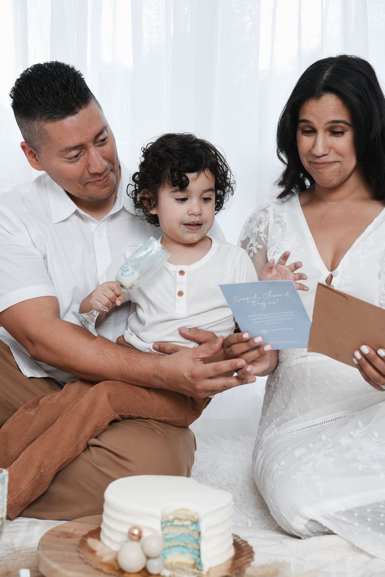 A series of photos showing a family sitting together and looking at mobile devices while wearing white and brown clothing.
