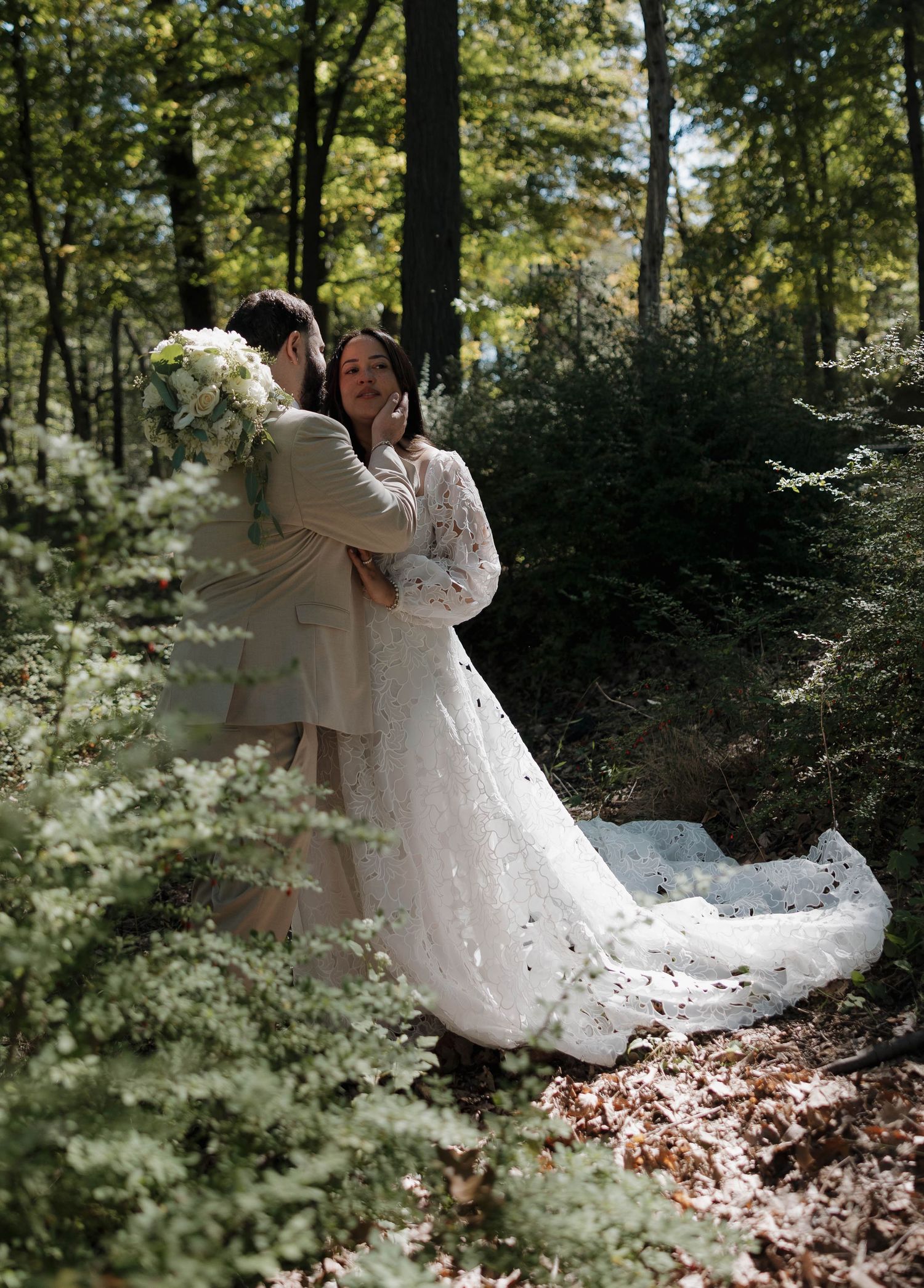 A romantic forest dance captured in a sequence of flowing movements with a white wedding dress.