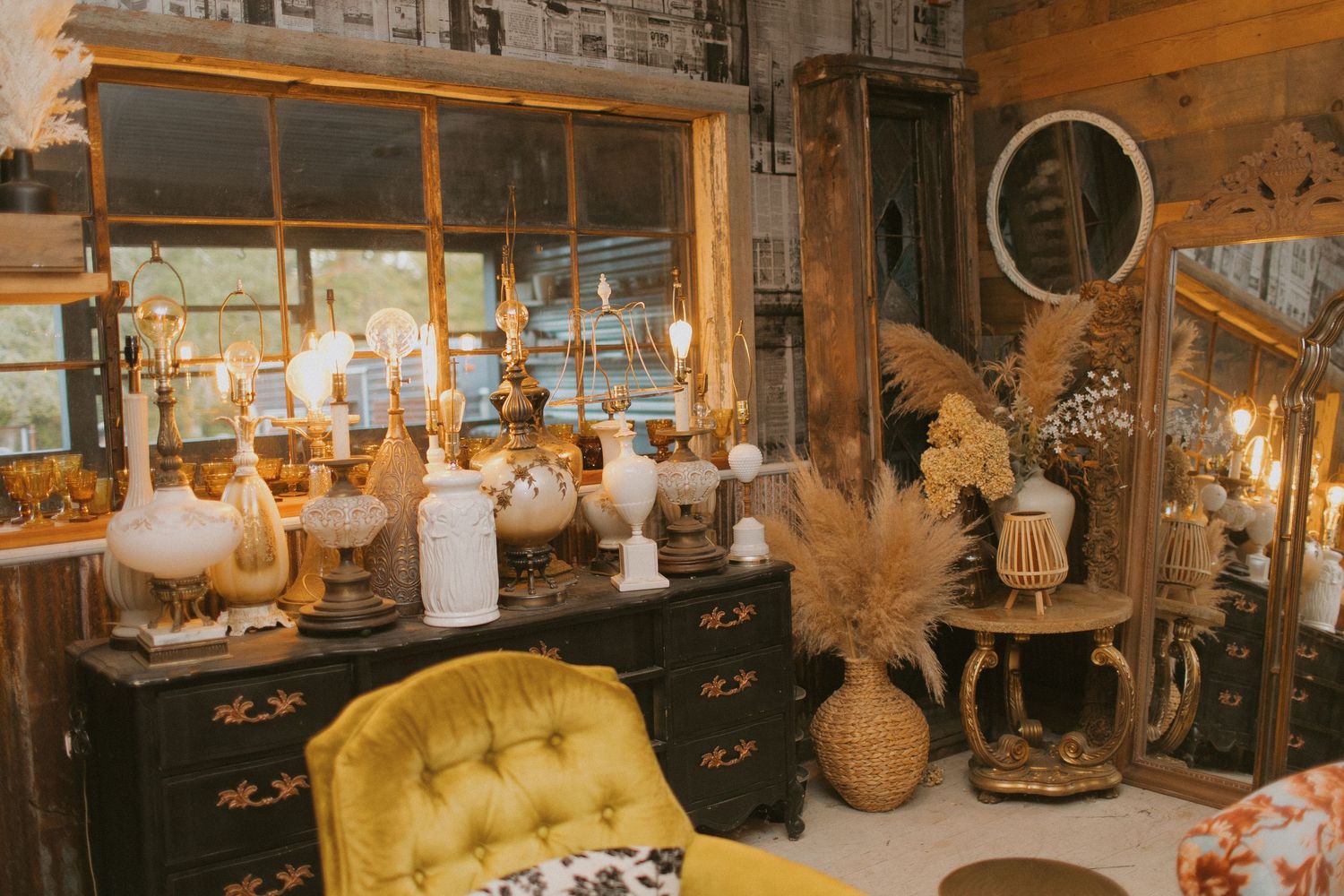 Rustic interior space with yellow furniture and vintage decor elements.