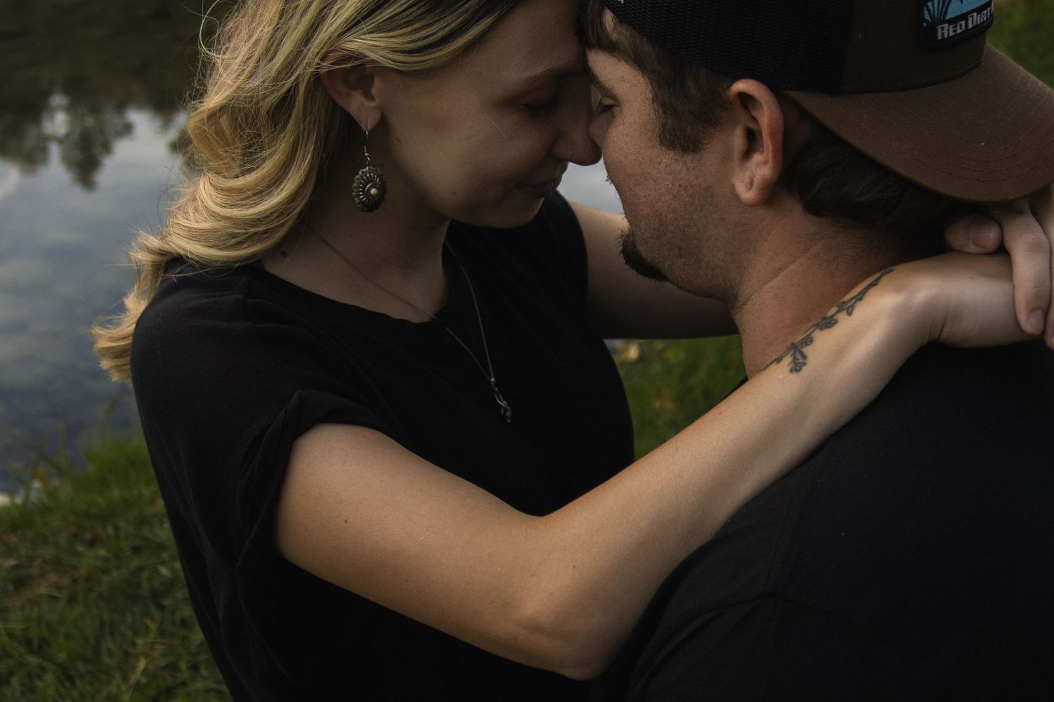 An intimate outdoor portrait session at sunset with natural lighting.