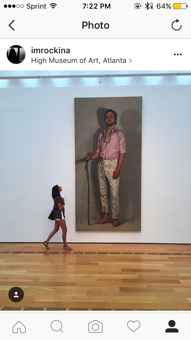 Woman views large portrait painting at High Museum of Art Atlanta, Instagram photo by imrockina.