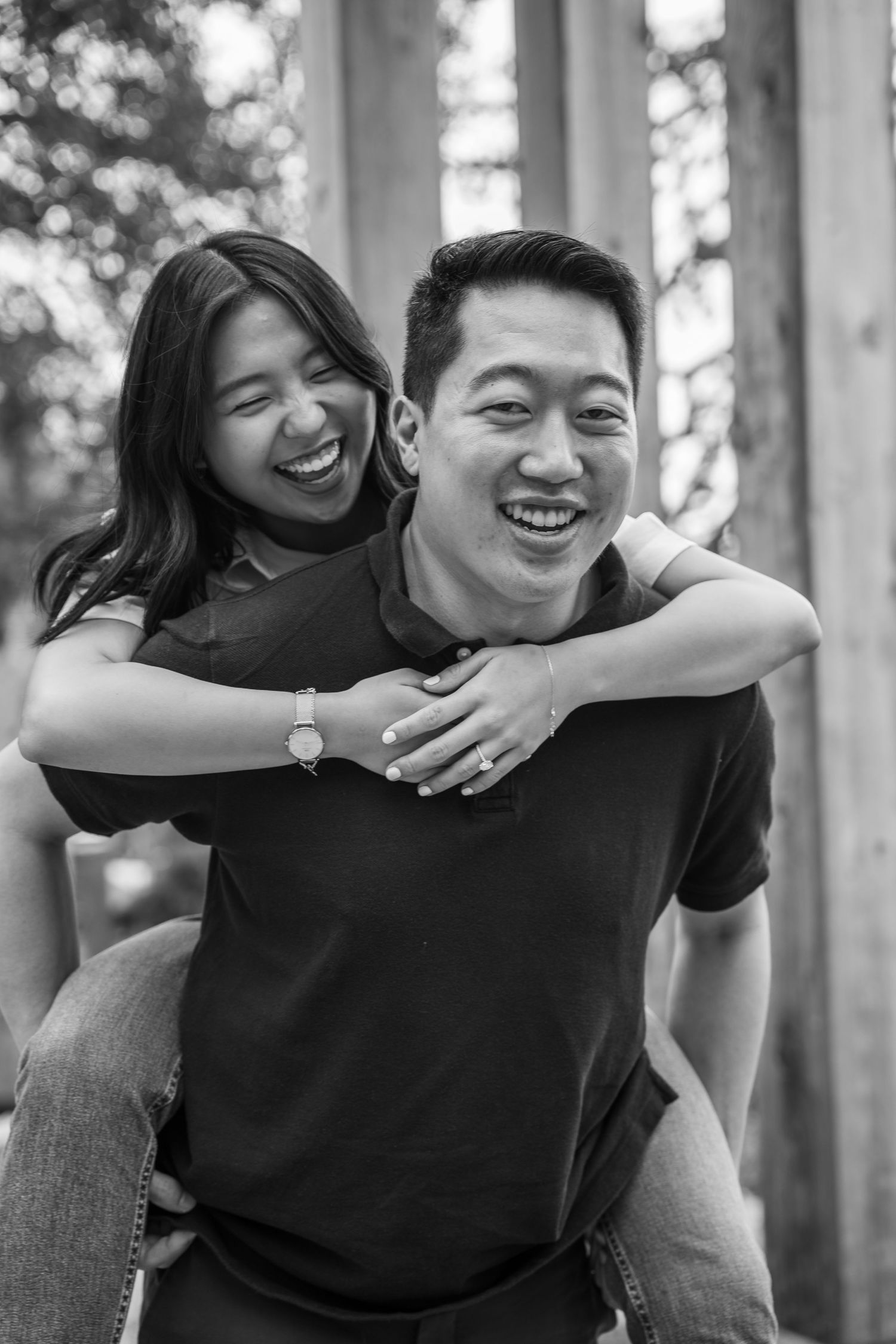 Monochrome image capturing the moment of an engagement proposal between two people