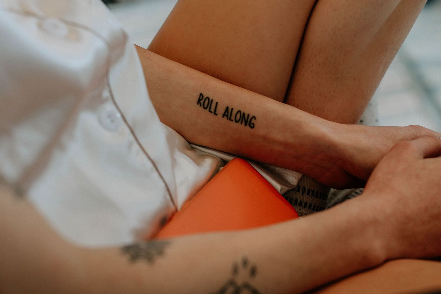 Close-up of a person's forearm with a bold 
