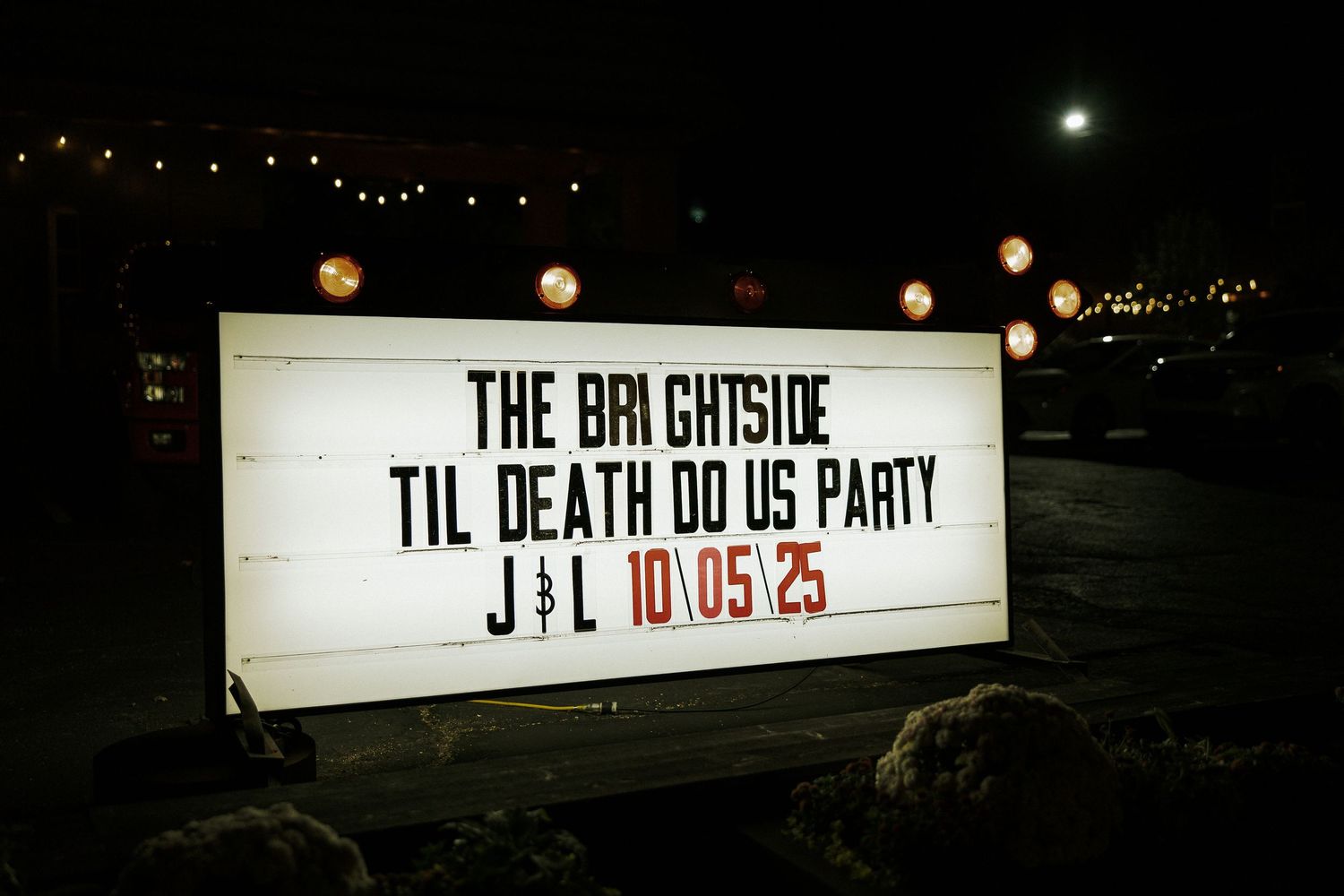 Illuminated marquee sign reading The Brightside Til Death Do Us Party J and L 10/05/25.