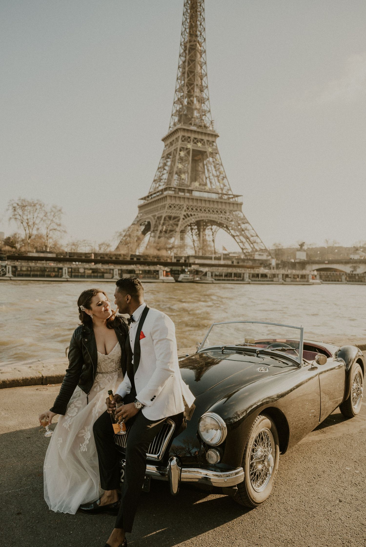 Vintage car photoshoot with the Eiffel Tower backdrop in Paris.
