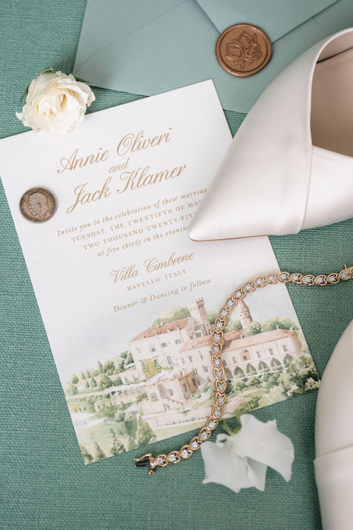 Elegant wedding invitation for Annie Oliveri and Jack Klamer at Villa Cimbrone, Ravello Italy with bridal accessories.
