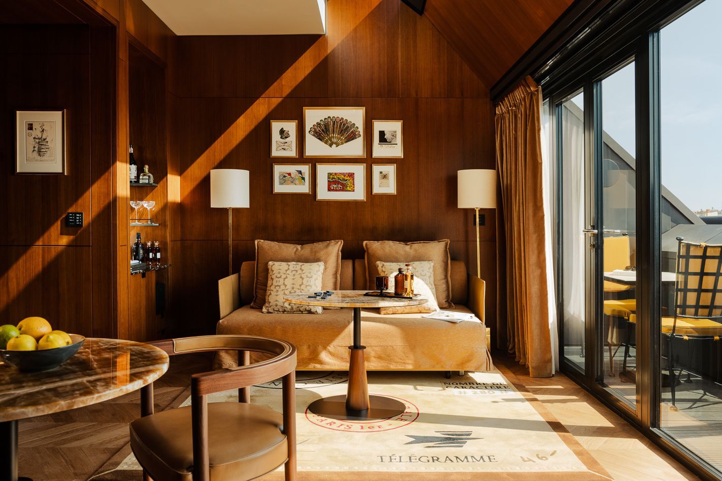 Cozy wooden cabin bedroom with modern decor, floor-to-ceiling windows, and vintage-inspired furnishings.