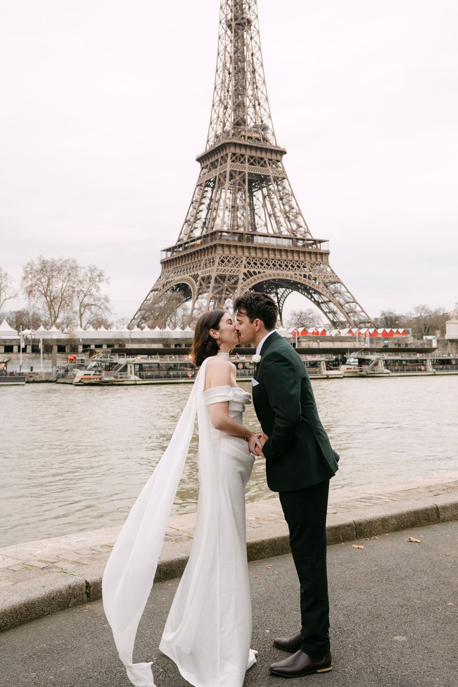 A romantic wedding photoshoot with the iconic Eiffel Tower in Paris creating a stunning backdrop.