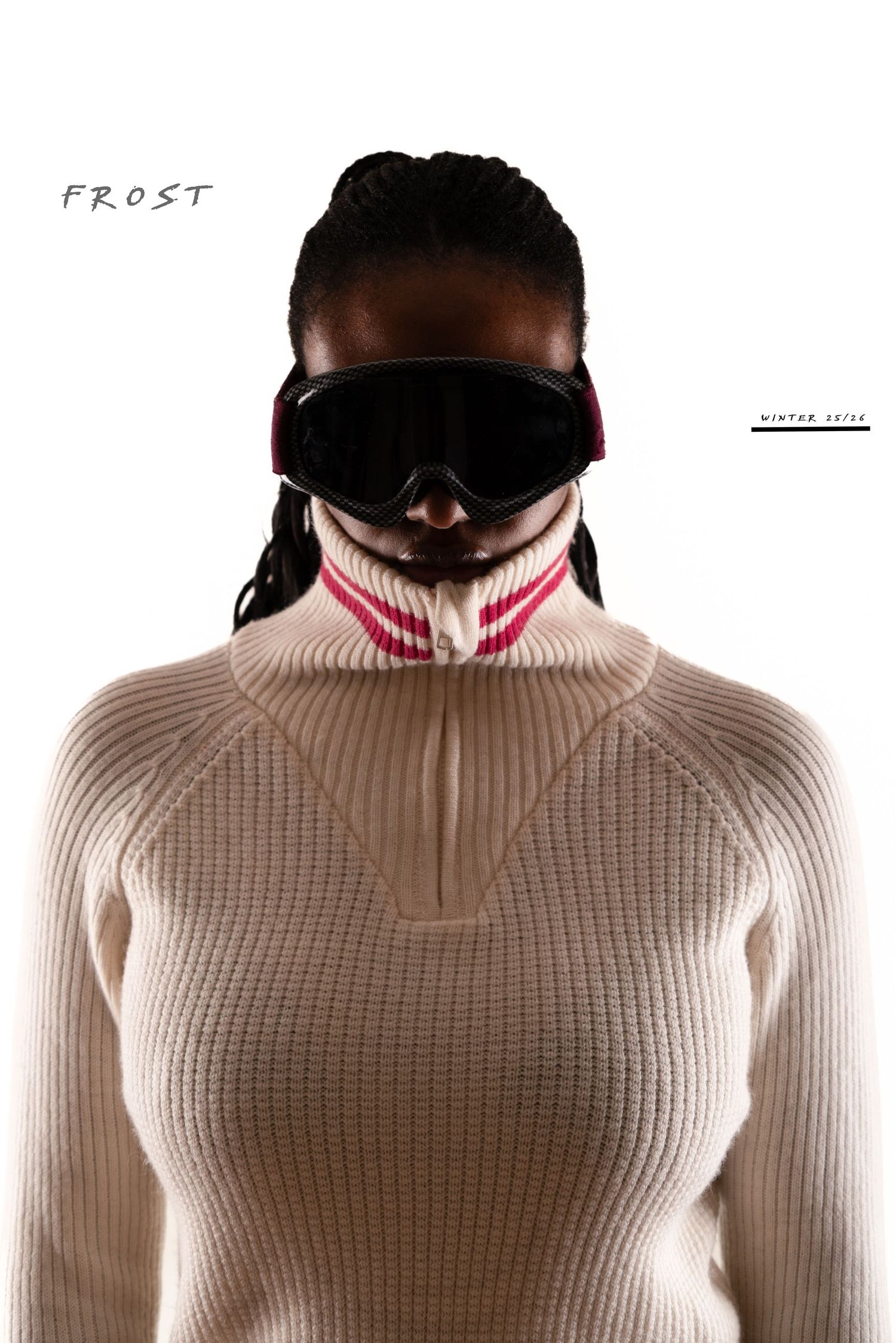 Artistic fashion series showing cream ribbed turtleneck sweater against white background.