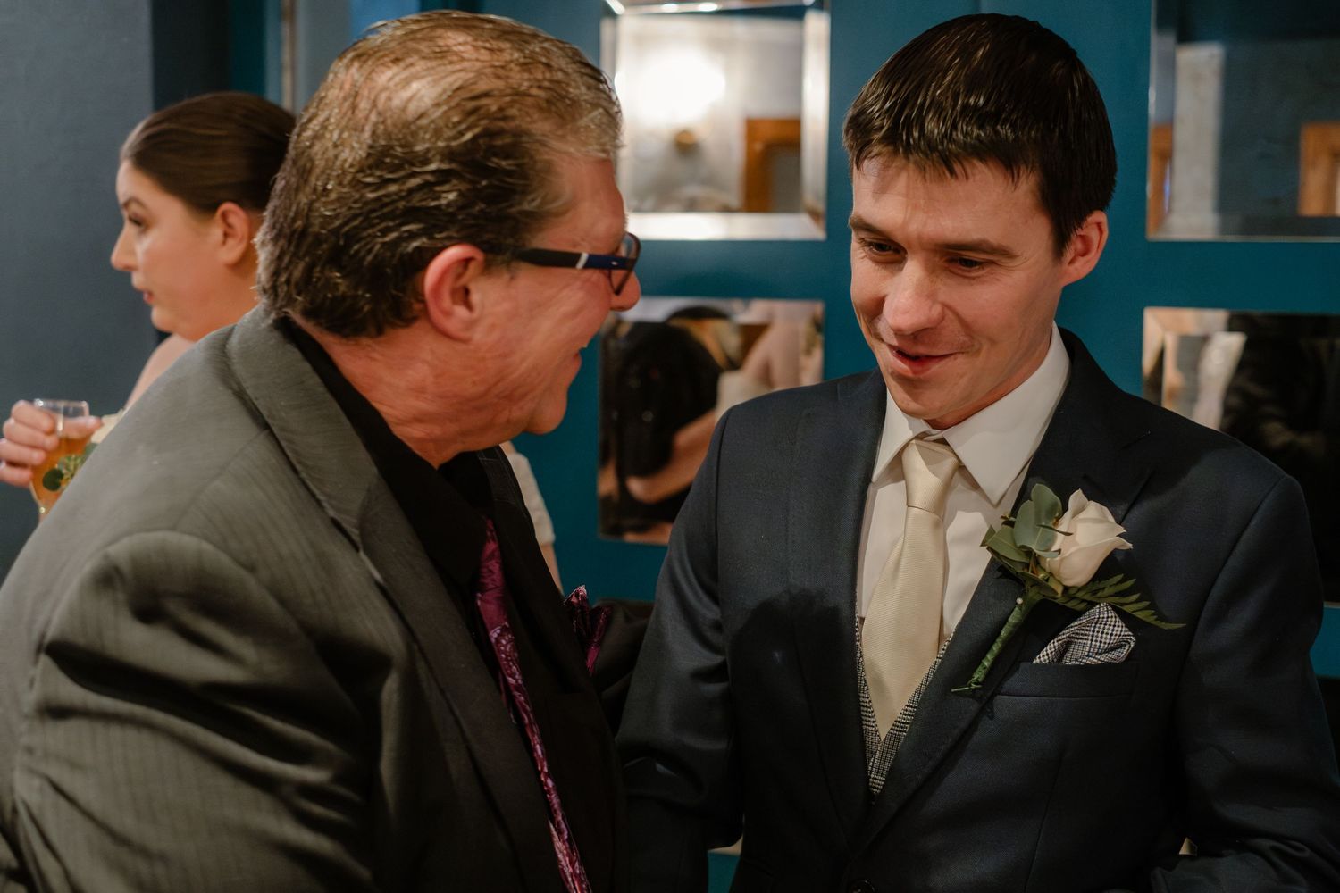 A conversation between guests during the wedding reception.
