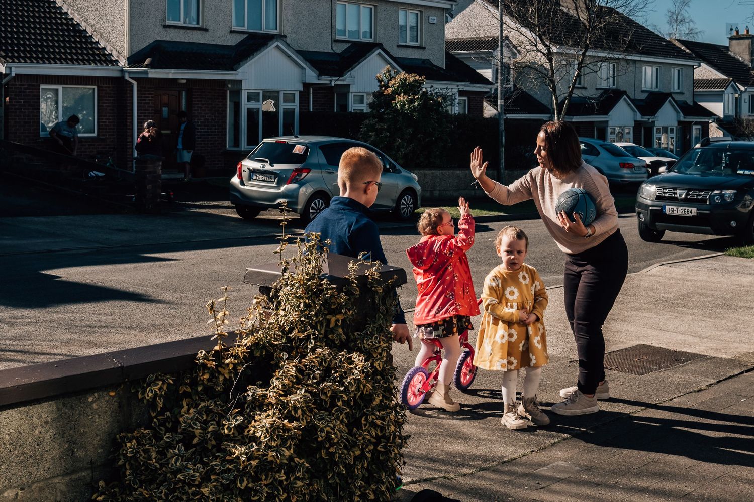 Group playing and having fun together on a residential street.