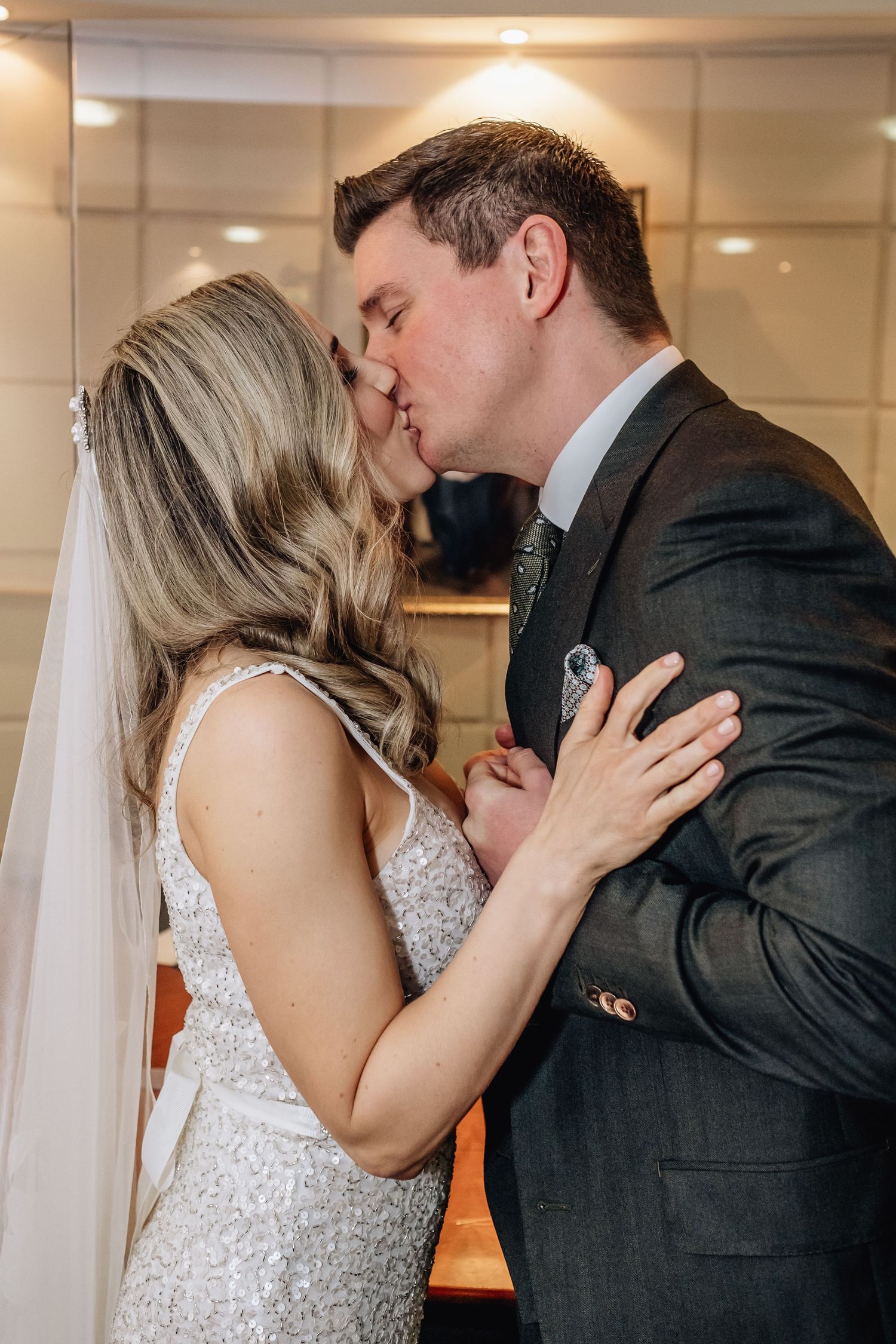 Wedding couple sharing intimate moments in a sequence of romantic poses.