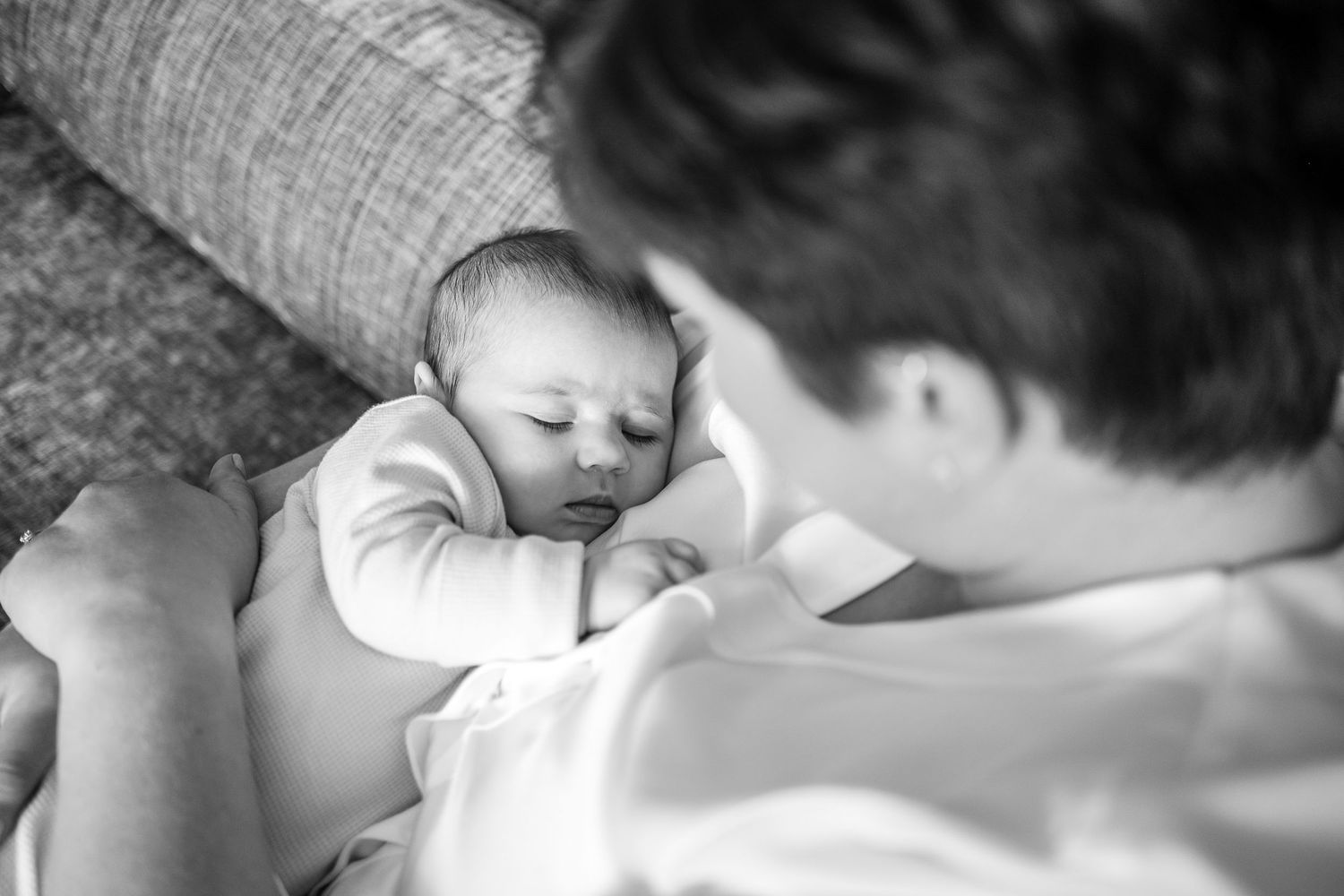 Black and white series of intimate portraits capturing emotional connection and care.