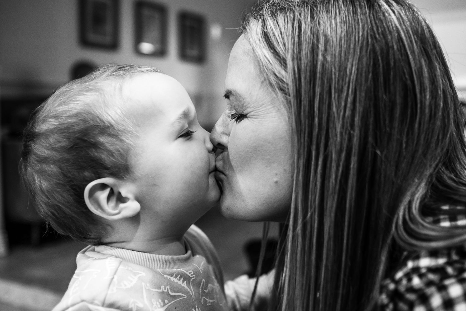 Black and white intimate portrait of mother and child.