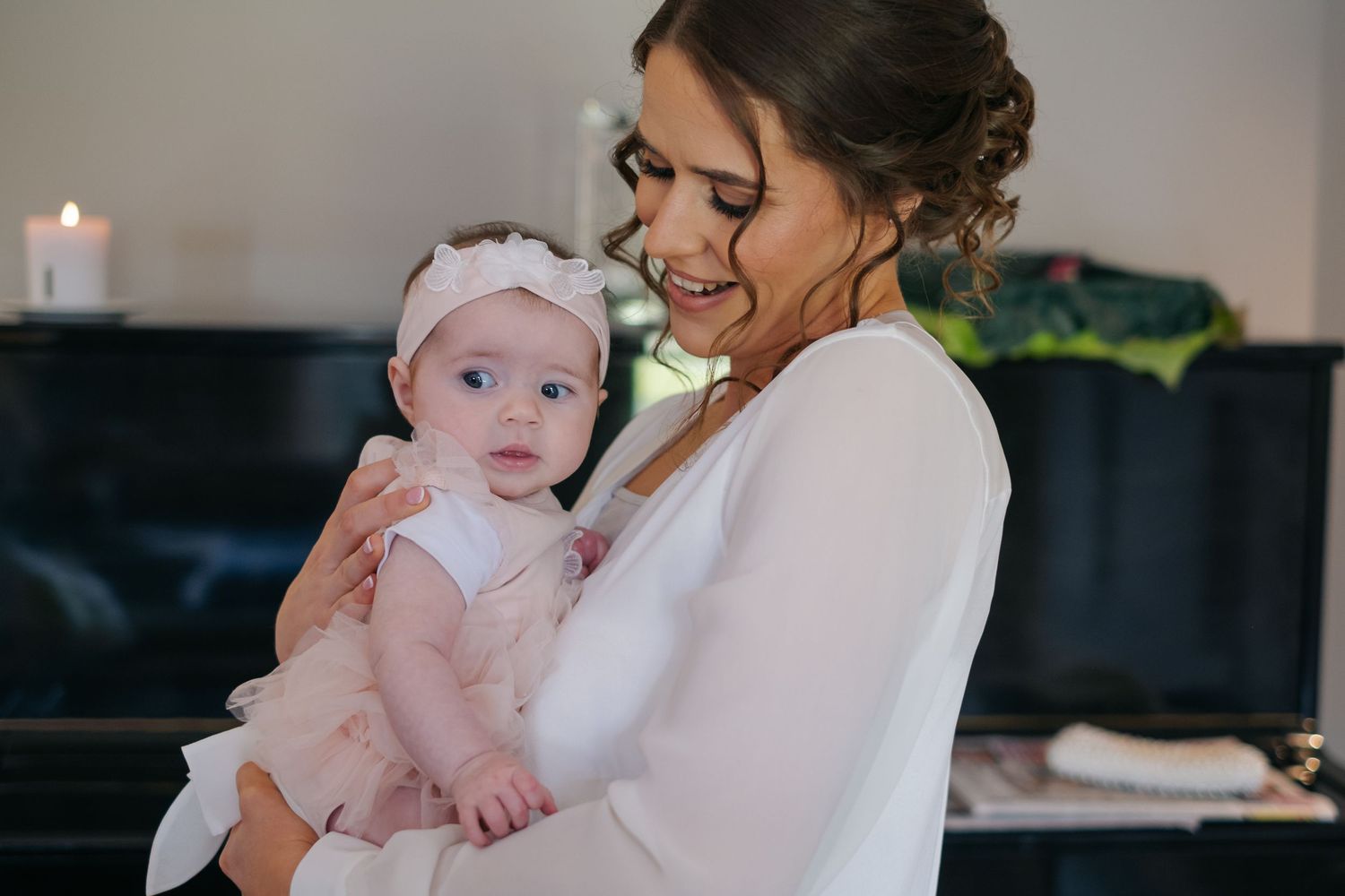 Wedding preparation moments captured in soft natural light.