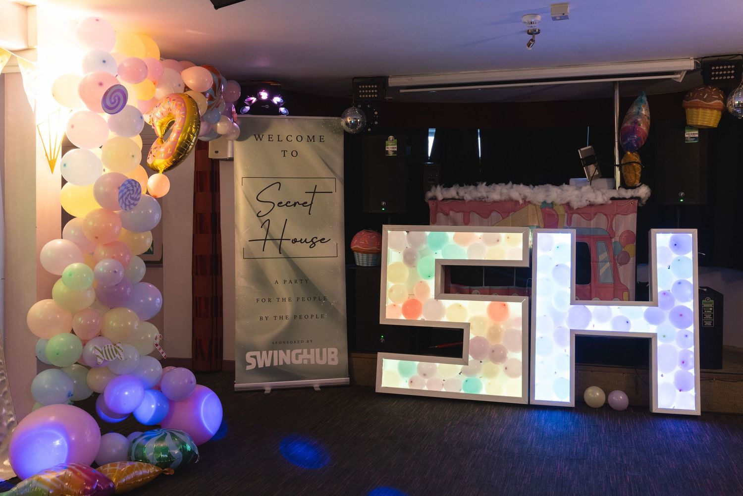 Adult club interior with balloons, bar and dance floor at Liberty Elite Lutterworth, venue interior photography