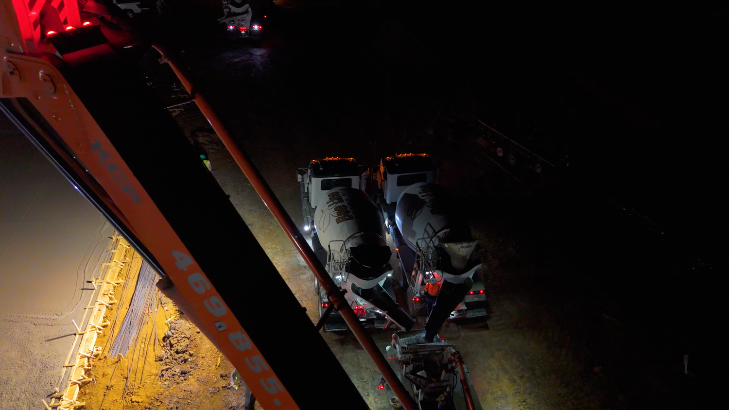 Heavy construction equipment operating at night captured by Kin & Lens Creative Media industrial photographer in Dallas Fort Worth
