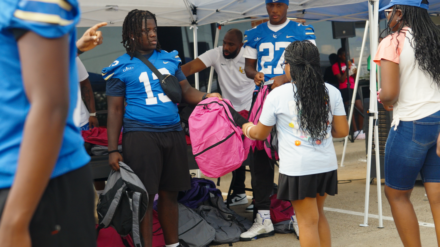Youth Back to School community outreach event captured by Kin & Lens Creative Media sports and event photographer in Dallas Fort Worth