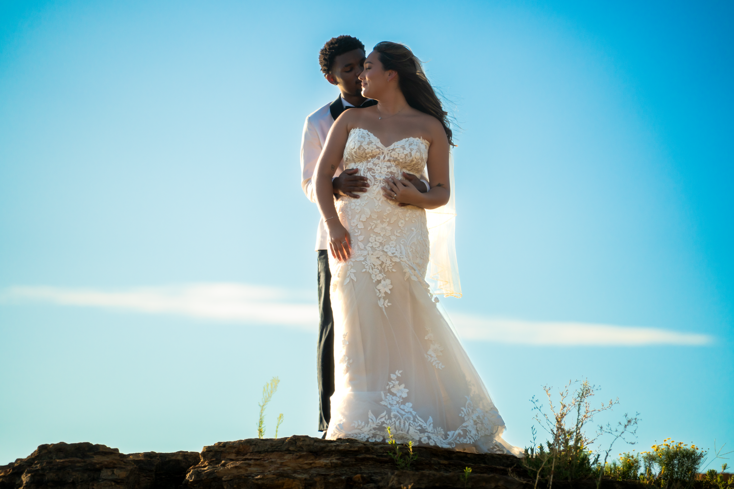 Bride and groom portrait session on hilltop captured by Kin & Lens Creative Media wedding photographer in Dallas Fort Worth